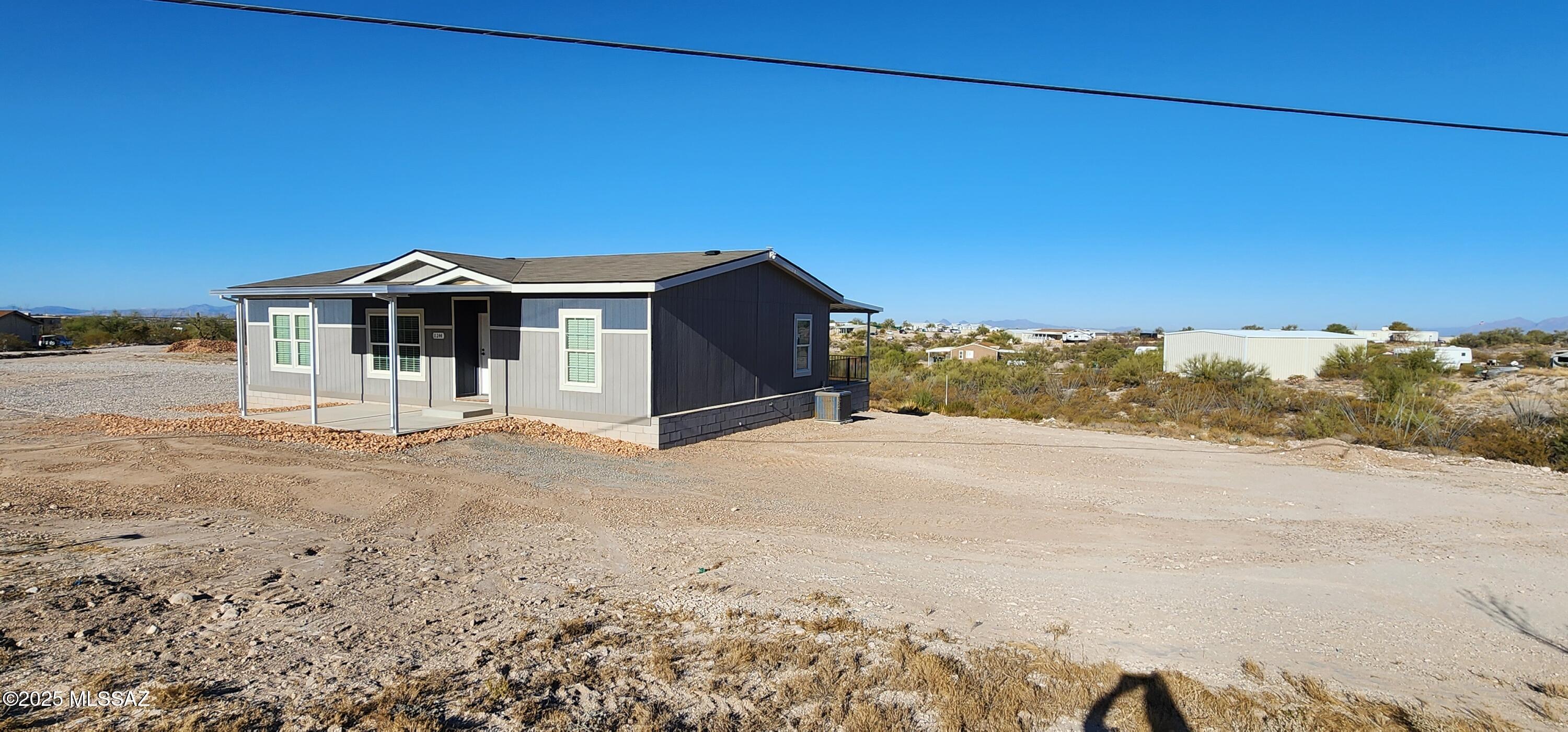 Seller financing available at 7 percent. 2021 CAVCO manufactured home, 3 beds/2 baths on an acre lot, with gorgeous views, lots of room for all your toys, horses, and more.
