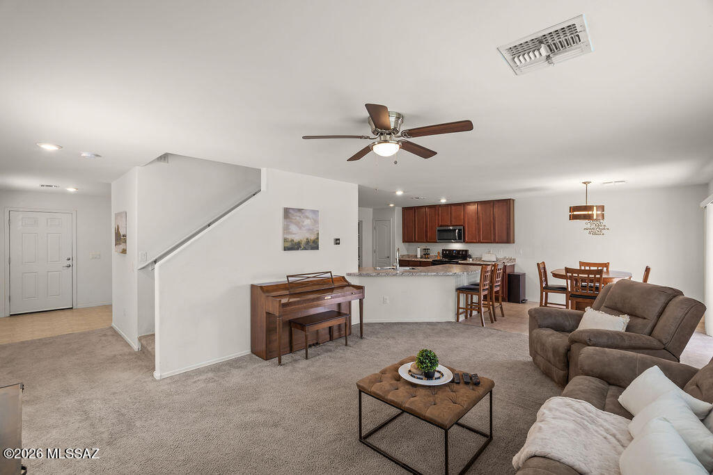 Flexible Living in East Tucson | Office, Game Loft, Abundant Storage & Quiet Neighborhood Setting
Seller will consider offers between $339,000 and $349,000.
Tucked away within a quiet loop in desirable East Tucson, this spacious 2,212 sq. ft. home offers the perfect blend of comfort, flexibility, and convenience. Ideally positioned near the boundary of both the Tucson Unified and Vail Unified School Districts, homeowners enjoy easy access to schools, shopping, dining, and everyday amenities while still enjoying the peace of a hidden neighborhood setting.
Step inside and discover a floor plan designed to adapt to your lifestyle. Just off the front entry, a dedicated office provides the perfect work-from-home space and can easily be converted into a fourth bedroom. Upstairs, a versatile loft is currently used as a game and craft area, offering endless possibilities as a media room, playroom, fitness space, study area, or additional living space.
Storage is abundant throughout the home, making it easy to keep everything organized and within reach. The generous living areas create a welcoming environment for entertaining guests, hosting family gatherings, or simply enjoying a quiet evening at home.
One of the home's greatest features is its flexibility. Whether you need additional bedrooms, hobby space, a home office, or room for multigenerational living, the layout allows new owners to personalize the spaces to fit their unique needs and lifestyle.
If you've been searching for a home that combines space, functionality, and the freedom to make it your own, this East Tucson gem deserves a closer look.