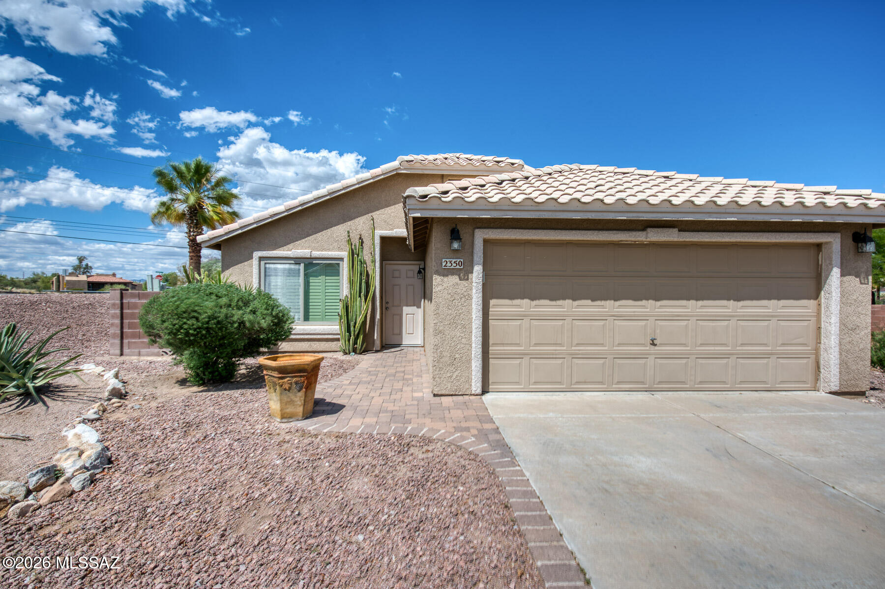 This charming Westside home, offers the perfect blend of comfort and convenience with NO HOA. This home features 3 bedrooms and 2 bathrooms and stainless steel appliances in the kitchen that stay. Enjoy the fresh feel of a recently painted interior and tile flooring throughout, creating a clean, cohesive look with easy maintenance. The beautifully updated primary bathroom features a spa-inspired walk-in shower with a frameless glass enclosure, decorative mosaic accents, and a built-in bench. The garage includes extra storage space, providing practical solutions for organization. A great opportunity to own a well-maintained home in a desirable Westside location!