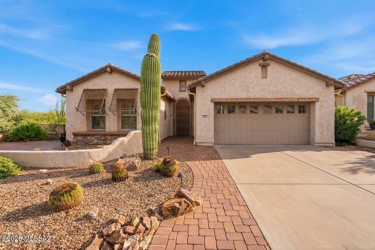Enjoy stunning sunsets and views of the nearby green space from this beautifully maintained home in the highly sought-after Quail Creek community. Perfectly positioned on a premium lot with no rear or side neighbors, this property offers exceptional privacy and a peaceful desert setting.

The bright, open floor plan features soaring ceilings, abundant natural light, and spacious living areas designed for both everyday comfort and entertaining. The well-appointed kitchen offers ample cabinetry, generous counter space, and a breakfast bar, while the primary suite provides a relaxing retreat with tranquil views, a walk-in closet, and an en suite bath. Step outside to the Arizona Room and enjoy breathtaking views with low-maintenance desert landscaping that lets you spend more time relaxing and less time working.

Residents of Quail Creek enjoy an award-winning, resort-style lifestyle with championship golf, a clubhouse, restaurants, swimming pools, a fitness center, pickleball, tennis, walking paths, arts and crafts studios, and an active calendar of clubs and events.

This exceptional home offers the perfect blend of comfort, privacy, and the best of Southern Arizona living.