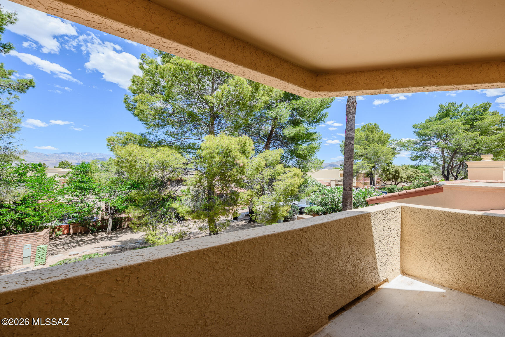Wonderful 3 bed, 3 bath, 1583 sq. ft. townhouse with backyard/ patio space and beautiful mountain views make this a rare find. Ask about assumable loan 4.5%! Downstairs bedroom can be used as an office/den/library or guest quarters with it's own full bath. Two bedrooms upstairs are nice size with their own private baths. Kitchen has newer appliances, lots of cabinet and counter space and is open to the family room and dining area. Sliding glass door leads out to enclosed North facing yard. Home exterior recently painted &Amazing Community pool/rec center redone! Laundry room is off the patio area. Two covered parking spaces in front for easy access. Guest parking space at end of block. Nice location