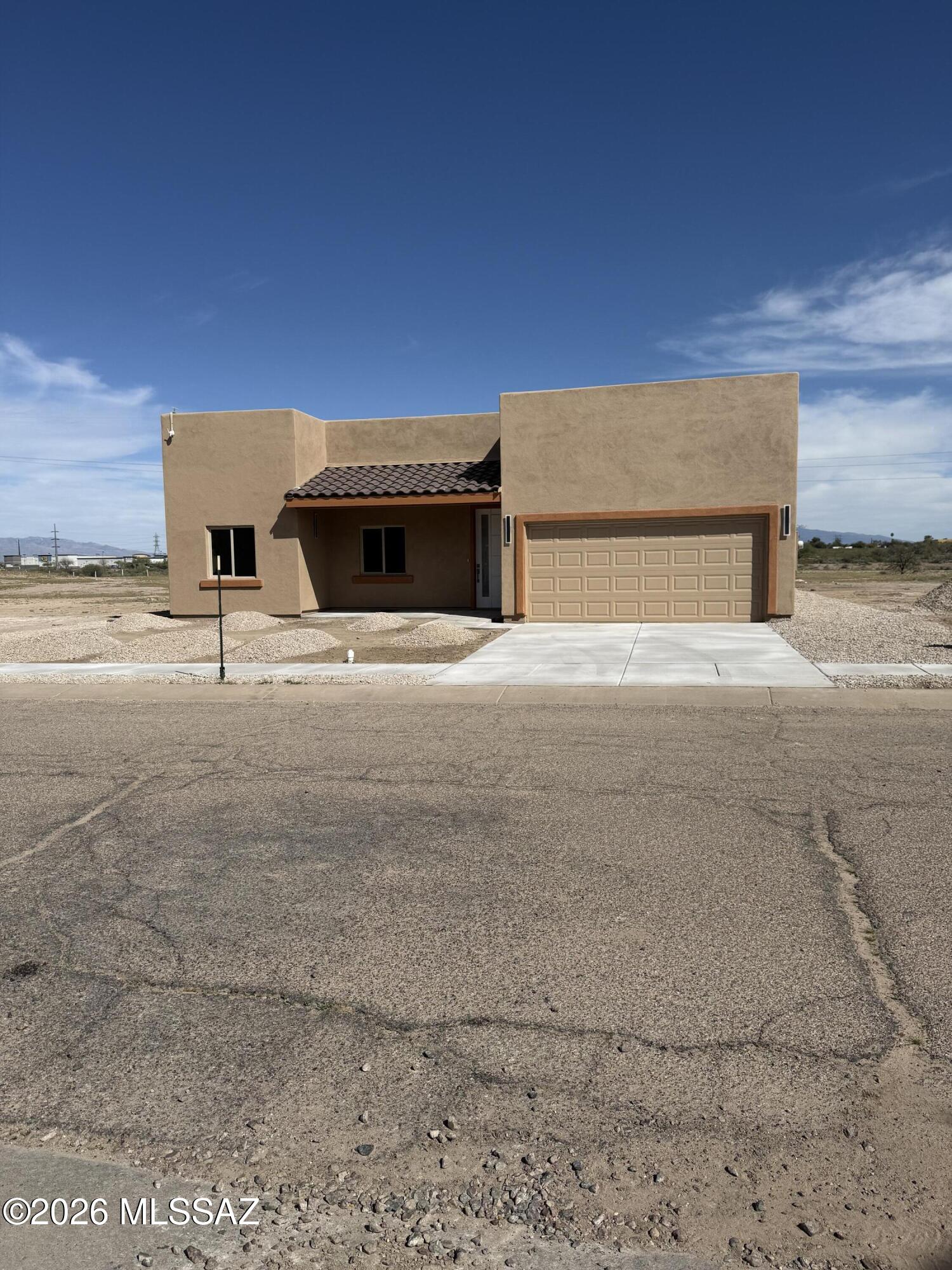 Beautiful, new construction home--this thoughtfully designed property features 9' ceilings & an open floor plan with a split-bedroom layout for added privacy. The spacious kitchen, complete with a large island & granite countertops, offers plenty of prep & gathering space. Both bathrooms showcase double vanities & custom-tiled showers. Tile flooring throughout adds warmth & durability. A versatile game room provides extra space for entertaining, hobbies, or a home office. Built with spray foam insulation for enhanced energy efficiency & comfort. Situated on a generous-sized lot with low-maintenance gravel landscaping in both the front and back. A spacious 2-car garage completes the package. TONS of upgrades throughout--DESIGNED TO IMPRESS & MOVE IN READY!