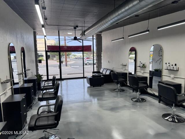 This commercial real estate rental offers a turnkey hair salon studio, featuring six stations and two sinks. The space has been fully remodeled, ensuring a seamless and quick opening for your business.