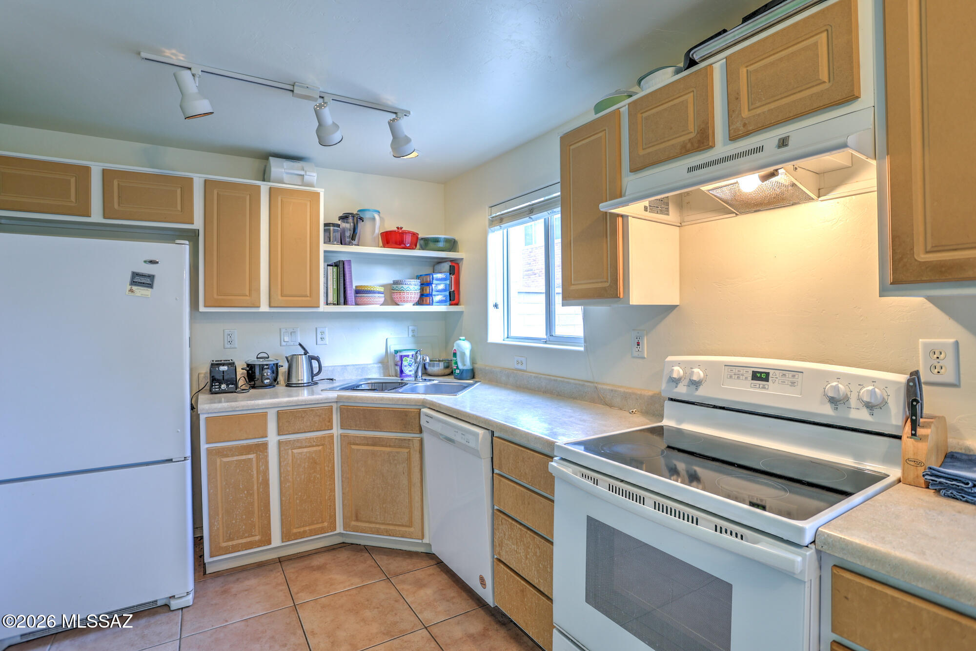 Range price $189,000 - $209,000, seller will accept or counter all offers made within the range. This centrally located, turn key, 2 bedroom 2 bath condo features tons of natural lighting, a beautifully remodeled kitchen, over sized bedrooms and a private patio perfect for entertaining or relaxing. New sewer line. Newer Roof & newer heating & cooling systems. Enjoy the community clubhouse, pool, common area maintenance, and garbage collection included in the HOA. The exterior paint, roof and sewer-line are also covered by the HOA. Close proximity to Starbucks, Trader Joe's, Himmel Park and Library, and Park Place Mall! These units also offer a great rental opportunity.