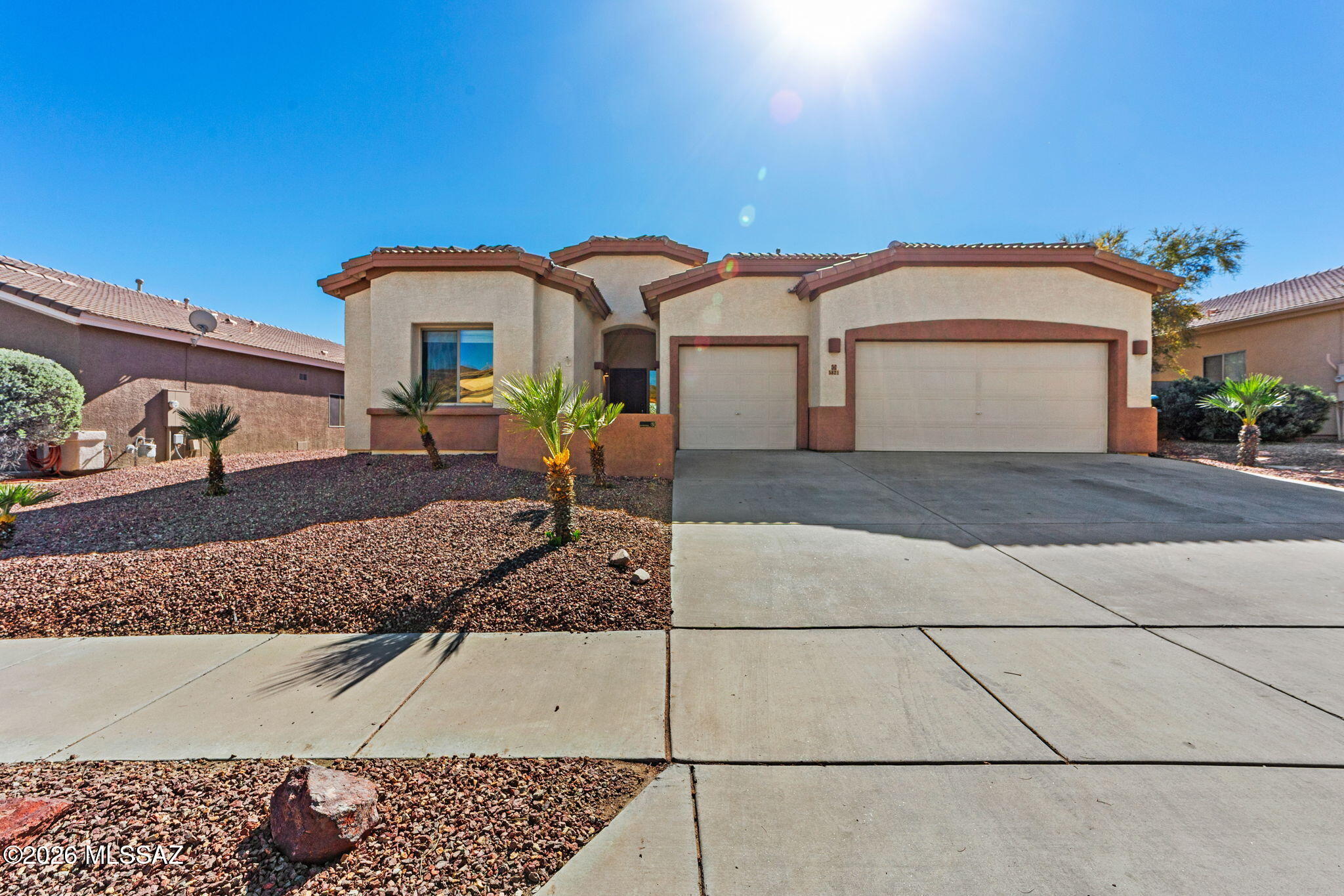 Welcome to this beautiful home located in the desirable Tucson Mountain Sanctuary community. This spacious residence offers approximately 2,291 sqft of comfortable living space with an open/inviting floor plan & tall ceilings throughout. The thoughtfully designed layout features a large kitchen with ample cabinetry, kitchen island, breakfast bar, and plenty of space for entertaining.
Enjoy Arizona living at its best in the backyard oasis complete with a conventional pool and relaxing jacuzzi, perfect for cooling off during the summer or unwinding in the evenings. The home also features tile flooring in the main living areas, generous storage, and a large 3-car garage. NEWER SOLAR SYSTEM!