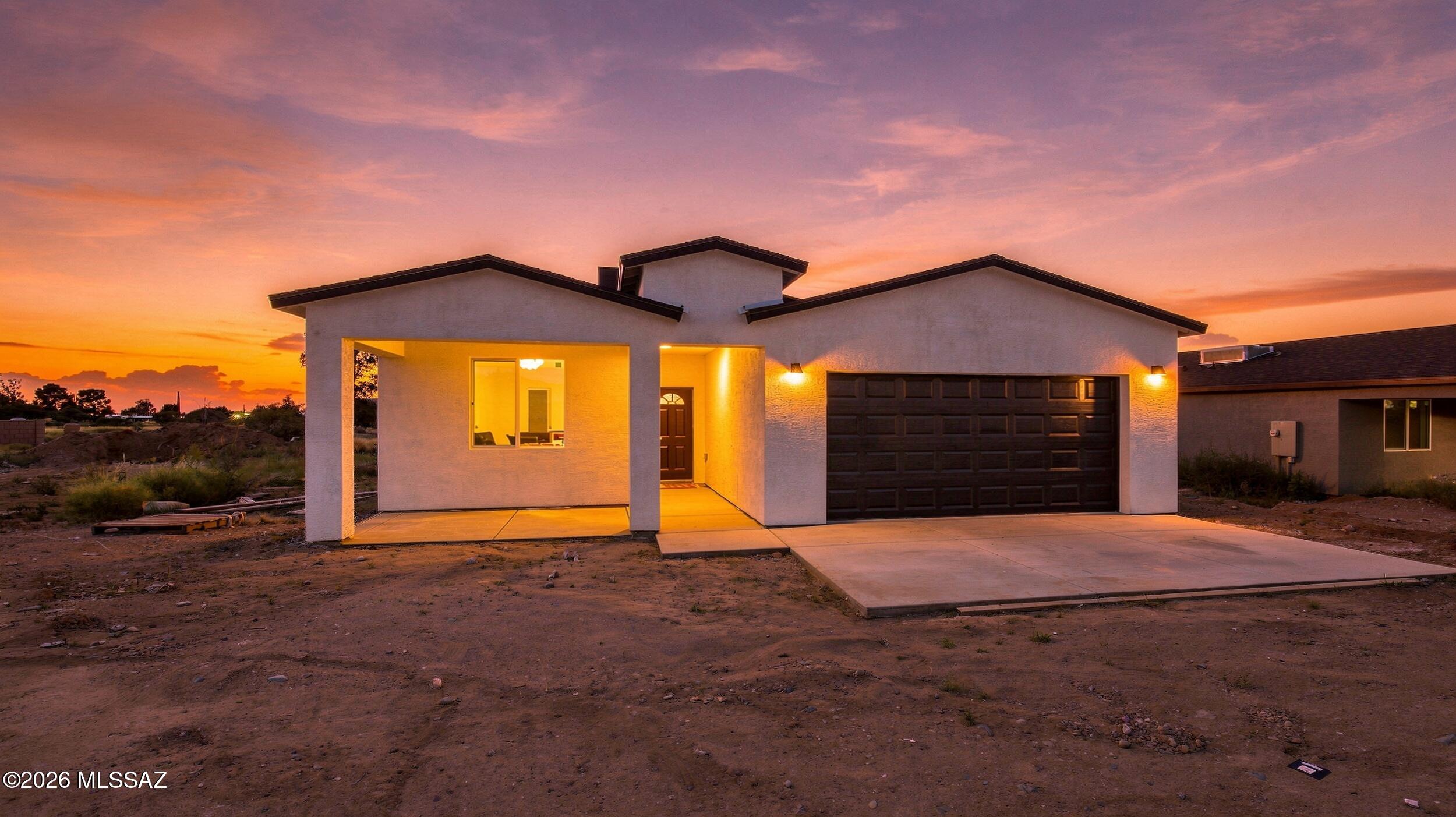 NEW construction custom build Gem that is absolutely turn-key! This move-in ready home features an over .17 acre lot, NO HOA, privacy, and beautiful mountain views! This contemporary style beauty is built with high quality materials, a 2 car extended length garage, large front porch and an appealing open concept. With soaring high 9ft ceilings, oversized windows, and light airy spaces bathed by natural light. This home features upscale ceramic flooring throughout, recessed lights, ceiling fans, and luxury touches. This roomy home is welcoming from the moment you step in! With an ample kitchen that has white custom cabinetry, sparkling quartz countertops, new SS appliances, and a breakfast bar to host guests. That Segways into your ample living room space for family gatherings and unwinding . With a primary bedroom is very ample, a true walk in closet wit built-ins, and cooling LED fan. With an ensuite bathroom that has dual sinks with matching quuartz, and a premium walk-in shower where you can relax.. Enjoy family time or the company of your guests in your huge private backyard. Dream up your ideal oasis and bring it to life! Your home is only minutes away from parks, entertainment, restaurants, and the award-winning Vail school district. Don't compromise! Come see it, fall in Love and stay.