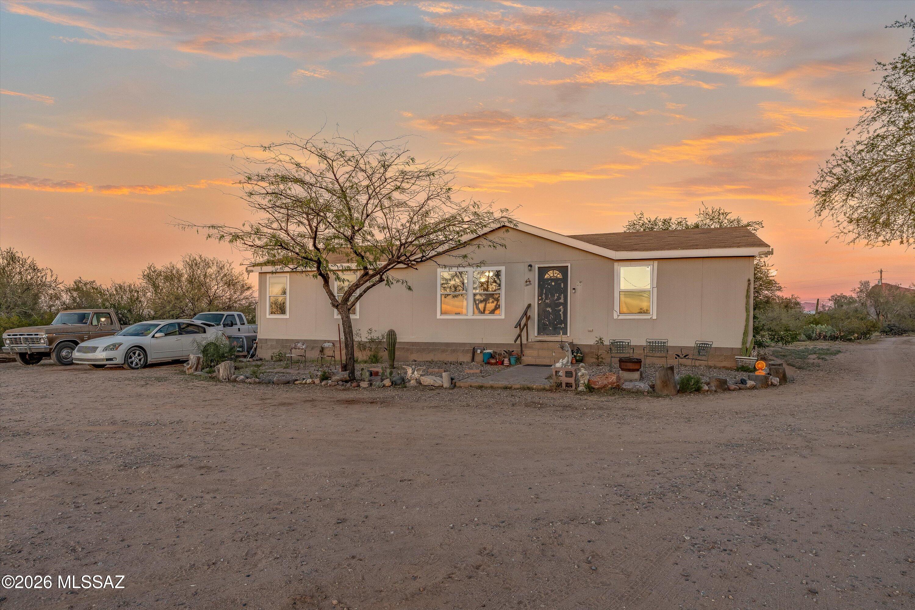 Situated on nearly two acres, this property offers peaceful, quiet surroundings with beautiful scenic views. The home features an updated primary bathroom and upgraded granite countertops, along with a spacious double vanity. A perfect blend of comfort and charm; this is truly a must see home.
