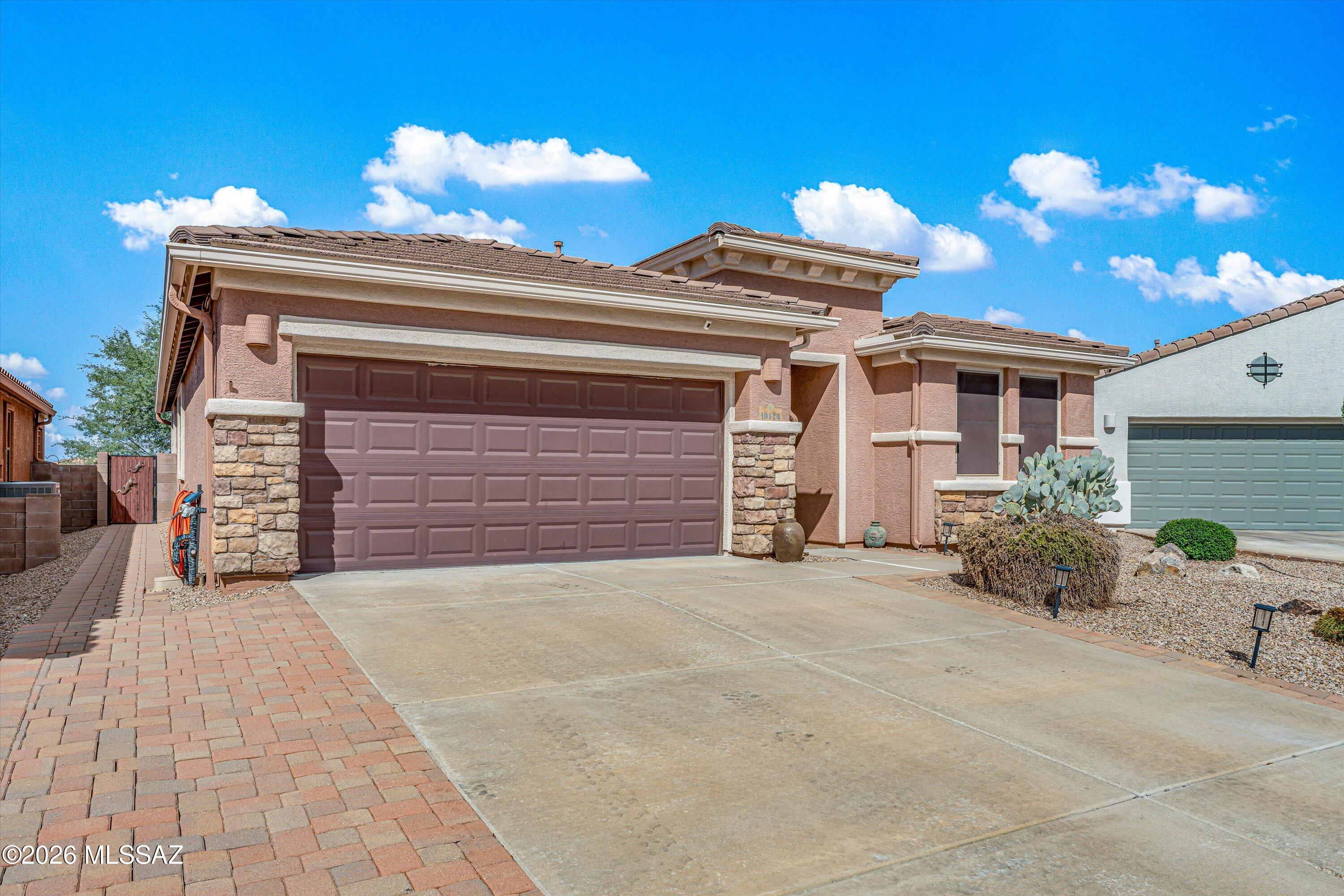 VA Assumable. Discover Del Webb at Rancho Del Lago, a gated premier 55+ active adult community, in this beautifully appointed home featuring a spacious open floor plan w/great room, formal dining area, & casual eating area off upgraded kitchen. Kitchen showcases solid-surface counters, tile backsplash, island, upgraded cabinetry w/pull-outs, & stainless-steel appliances, including a newer gas range, DW & microwave. The versatile 3rd bedroom includes a built-in desk & Murphy bed. Additional features include a custom front security door w/matching stained-glass side light, R/O, water softener, custom light fixtures & an attached garage w/built-in cabinets. Enjoy covered patio living w/sunset views, no rear neighbors, built-in BBQ, pavers & a hot tub hookup. 50-AMP RV
hook up adds convenienc