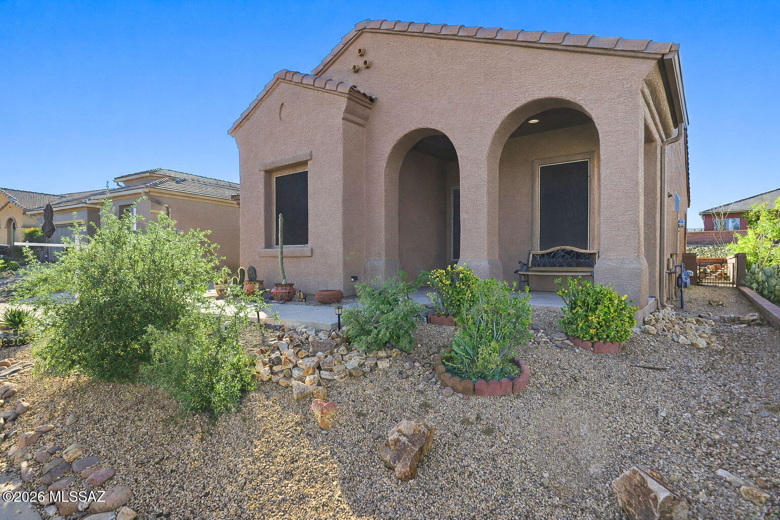 Furnished and move-in ready! Located near the popular Canoa Ranch GVR Center, this charming 2BR/2BA home offers the easy desert lifestyle buyers love. The split-bedroom floor plan provides privacy for owners and guests, while the welcoming foyer opens to a bright great room with soaring ceilings and a casual dining space perfect for gathering. The kitchen offers abundant storage and flows seamlessly into the living area, making everyday living and entertaining a breeze. Relax on the covered patio with morning coffee or enjoy peaceful Arizona evenings outdoors. The 2-car garage features extensive storage and a built-in workbench for hobbies or projects. Close to GVR amenities including pools, fitness centers, clubs, and social activities. Seller will provide a home warranty for added peace of mind. Whether you're seeking a full-time residence or seasonal retreat, this inviting Green Valley home is ready to become your "Home Sweet Desert Home!"