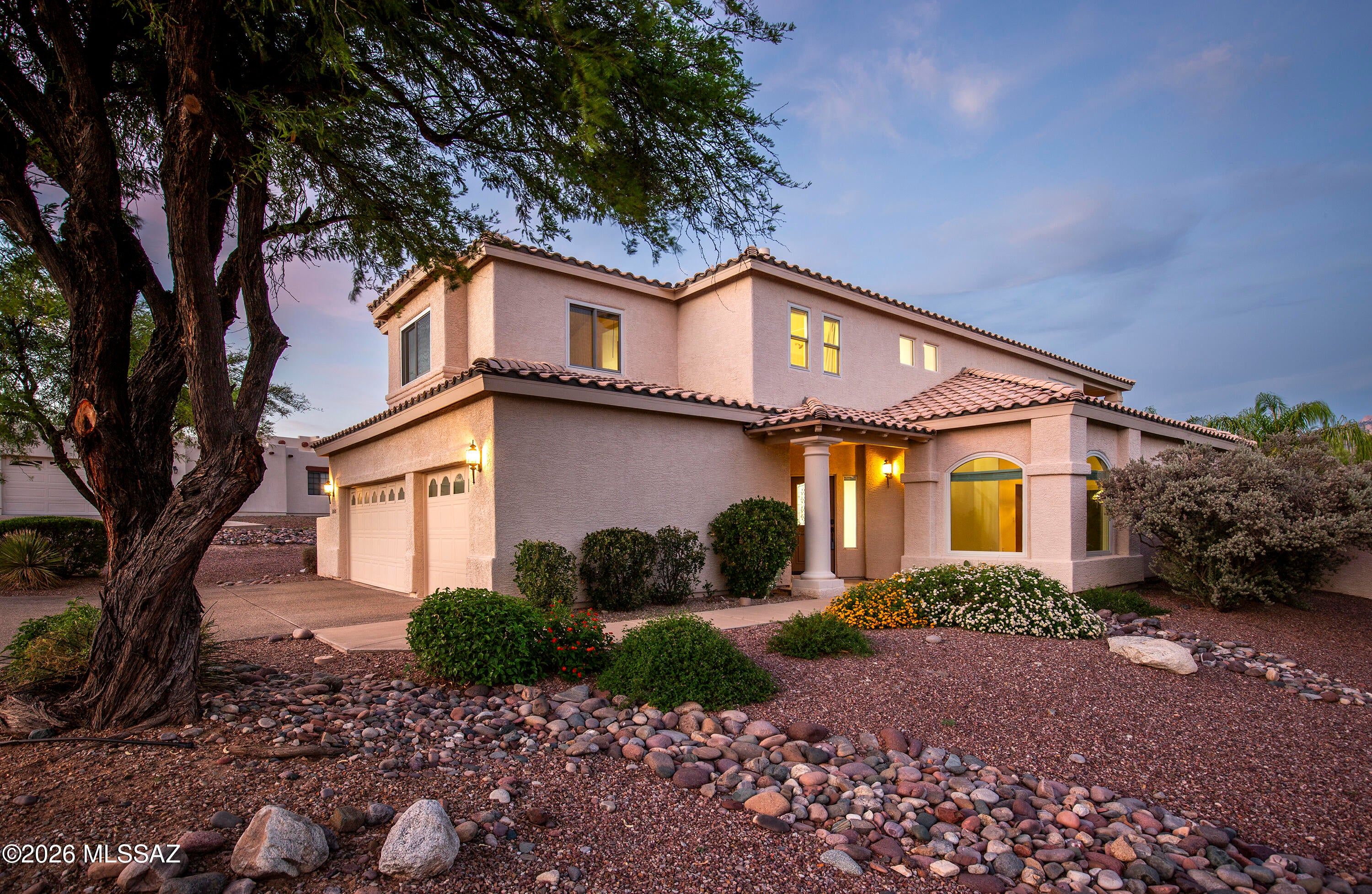 Resort Style living in Oro Valley! Spacious and bright 5BD, 1bd on first level,  3BA Home with Stunning views of Pusch Ridge Mtn and surrounding desert on large lot, with mature landscaping. Located in the highly desired & gated Canada Hills Estates. Features new paint inside, many new light fixtures & faucets, Anderson Windows (almost all) and doors, 3 car garage, central Vacuum. Boasts a resort style yard with sculpted mature green  landscaping,  glittering pool & spa. Soaring 2 story foyer entry includes great room and sweeping stairway to 2nd story. Large primary Bdrm has private balcony to enjoy full Catalina mtn views and overlooking the expansive  backyard with grass, Citrus tree's, very private lot!  Meticulously maintained by same family since 1999.