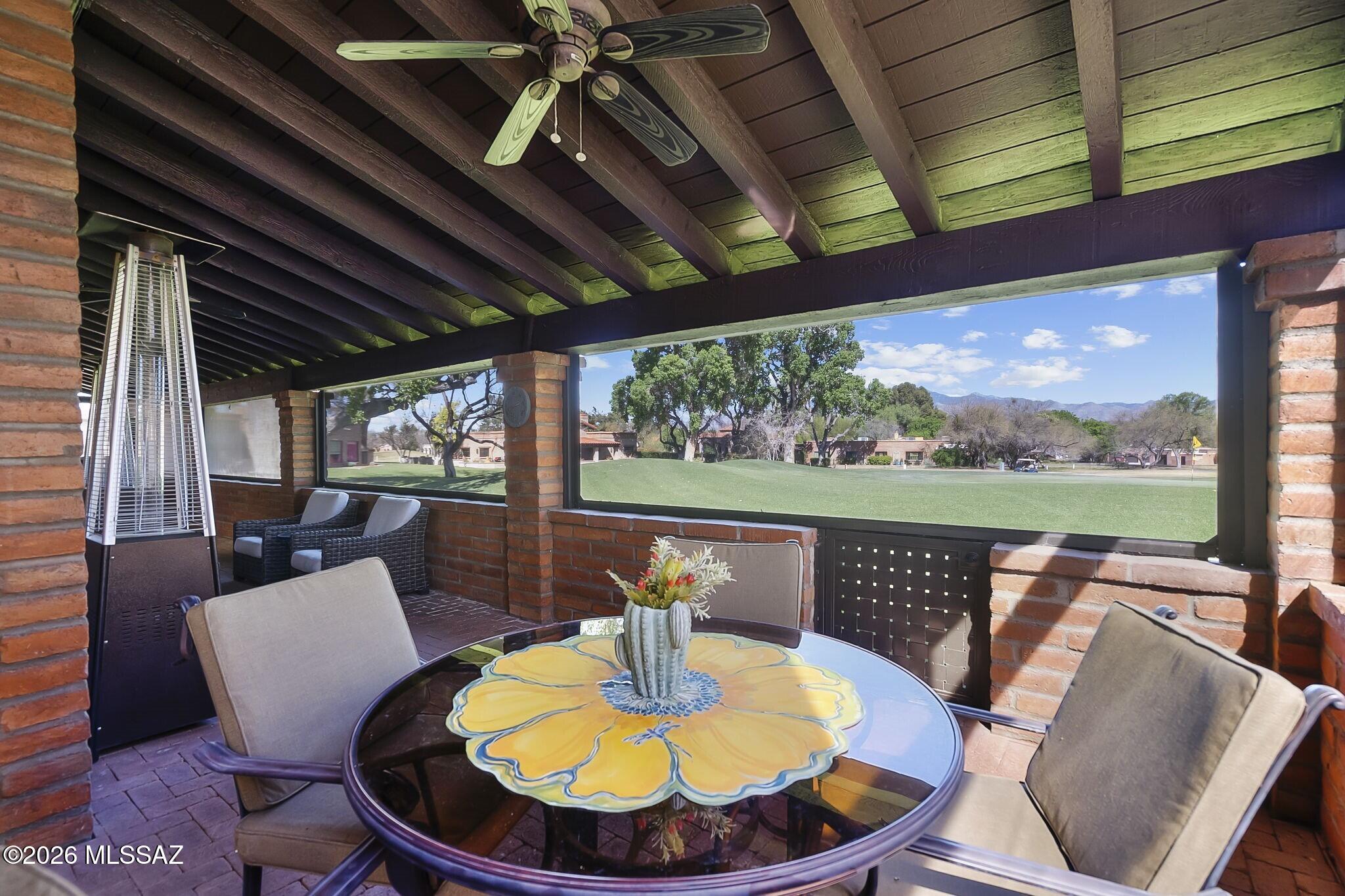 Nestled in the much-sought-after Tubac Country Club Fairway Estates, on the Tubac Golf Resort's Otero third hole, this stunning home provides a front-row seat to one of Southern Arizona's most captivating landscapes. Expansive views of the Santa Rita Mountains stretch far beyond the dynamic fairway, anchoring the rear patio and resort-style outdoor spaces, including the nearby enclave pool and open-air cabana. Dramatic interior features rich mesquite wood, exposed-beam ceilings, custom tile, brick feature walls, and arched doorways. Separate living areas offer creative options for relaxing and gathering. Practical features include a two-bay garage plus an oversized RV garage with extra space for storage or a hobby area. timeless design to create an extraordinary home.