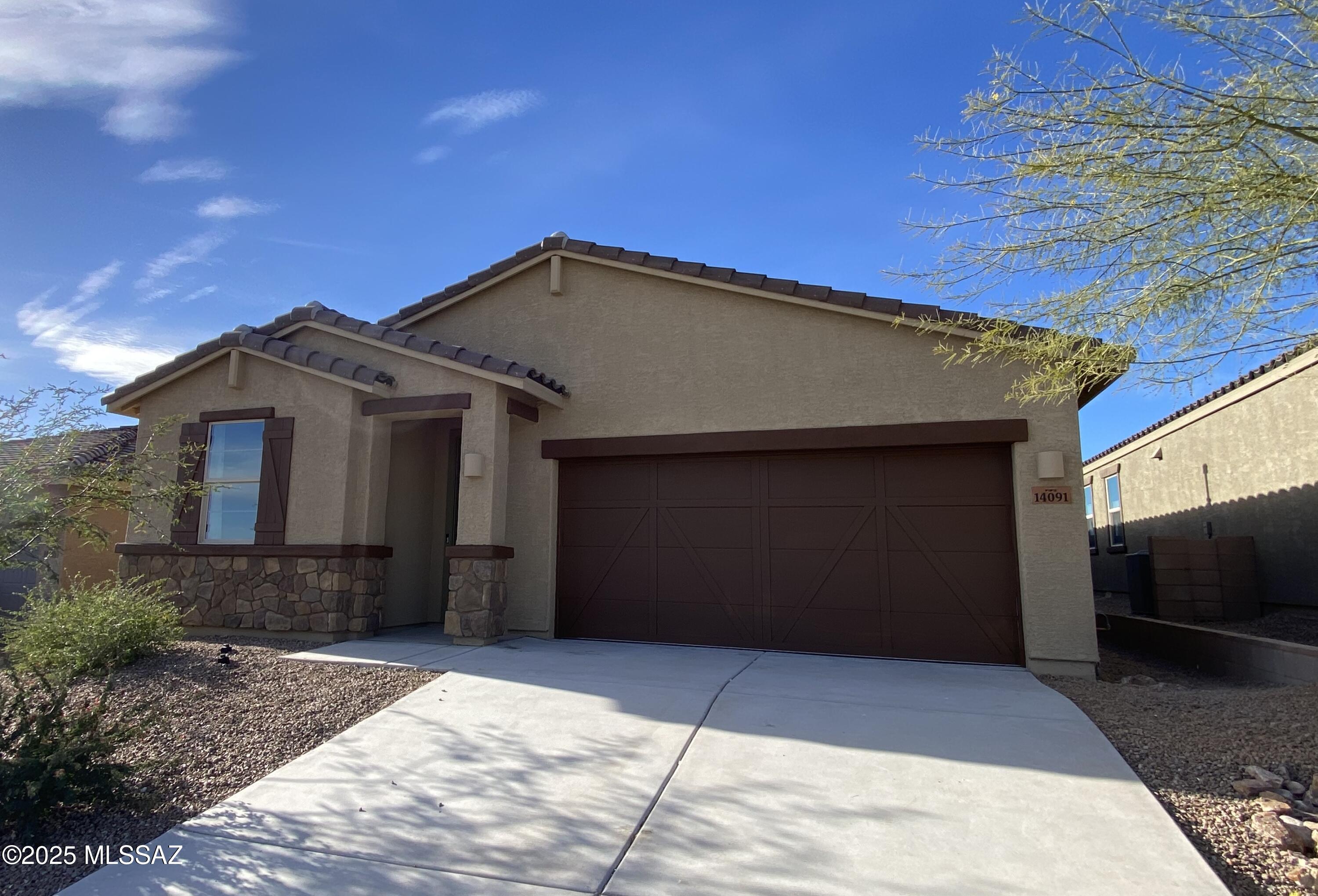 Live in this gorgeous 4 BR, 3 BA former model home in the top rated Vail School District!  Open concept split bedroom plan with 2 en-suites & double vanity at the primary & hall bath. Large kitchen with walk-in pantry, stainless appliances, & a huge island w/4 seats at the breakfast bar. Relax to sunset mountain views from the covered patio or a 12x14 gazebo with ceiling fan, string lighting, & 2 circuits of power. Bonus living  space perfect for play or work.  Large laundry room with washer, dryer, & cabinets!  Finished & insulated garage with smart opener w/camera. The community offers golf, playgrounds, dog park, shopping, biking, & outdoor activities. Pets considered. Available July 2025, unfurnished, partially or fully furnished.