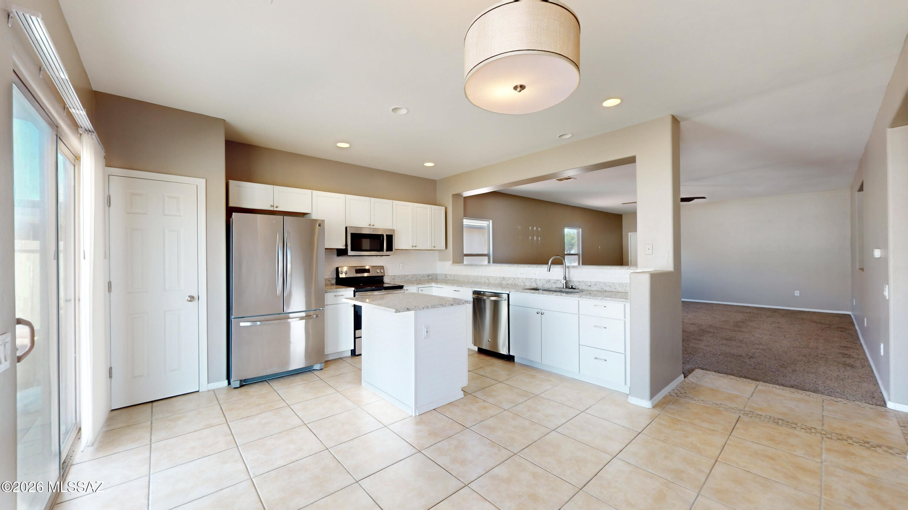 Beautiful 4-bedroom, 2-bath home in Red Rock! This move-in ready home features 9-foot ceilings throughout, paid-off solar panels, extra garage storage, and a private backyard. Enjoy amazing community amenities including a water park, resort-style pool, skate park, pocket parks, walking trails, and community events. Rare short sale opportunity!