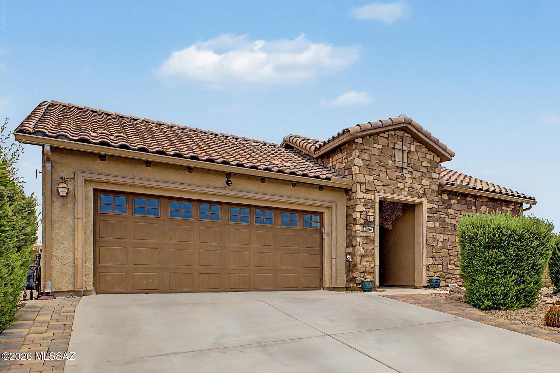 This beautifully upgraded 2-bedroom, 2-bath home with a versatile den is located in a desirable 55+ community and offers the perfect combination of comfort, style, and thoughtful design. The spacious primary suite features a luxurious oversized walk-in shower with dual rain showerheads and a generous walk-in closet complete with custom soft-close drawers and shelving, providing exceptional organization and storage. The thoughtfully designed kitchen is as functional as it is beautiful, featuring a large walk-in pantry, Oak Craft cabinetry with convenient slide-out shelves, and a raised dishwasher for added comfort and ease of use. The double stainless-steel sink is complemented by an instant hot water dispenser, making meal prep and cleanup effortless. The heart of the home also showcases a a custom built-in buffet with elegant granite countertops and view-through display cabinets, creating both beautiful storage and an inviting space for entertaining. The home also features an upgraded laundry room designed with both convenience and functionality in mind. It includes a utility sink, wine fridge, and a stand-up freezer surrounded by custom cabinetry, providing an abundance of storage. With generous counter space for folding laundry and plenty of room to hang clothes, this well-designed space makes everyday chores effortless. Outside, you'll find a private side courtyard, offering a peaceful space to enjoy your morning coffee, entertain guests, or simply relax. The backyard offers your own private retreat featuring a beautiful, heated mineral pool and spa, perfect for year-round enjoyment. The scenic fencing enhances the outdoor space by preserving the surrounding views while providing a sense of openness and privacy. If you ever decide to venture beyond your own private oasis, the community offers an exceptional lifestyle with a saltwater community pool and hot tub, a state-of-the-art fitness center, tennis courts, pickleball, bocce ball, and an immense variety of clubs, social events, classes, and activities designed to keep you as active and engaged as you'd like. This meticulously maintained home offers quality upgrades throughout and is ideal for buyers seeking low-maintenance living in an active adult community while enjoying the luxury of their own private resort-style backyard.