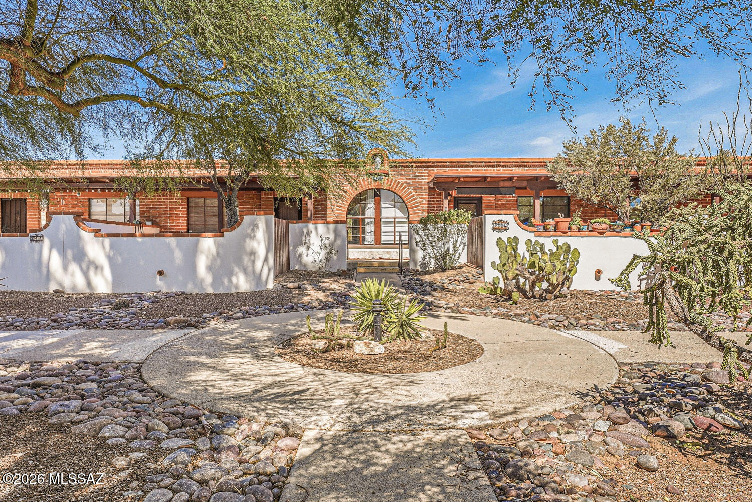 Incredible value! Beautifully updated and move-in-ready, this home offers stylish tile flooring throughout and a stunning walk-in shower with custom tile finishes.   The modern kitchen features gorgeous quartz countertops, brand new cabinetry and full-size brand new stainless appliances t hat have never been used! With its fresh, updated feel, this home is ready to enjoy from day one!   Convenient back patio laundry includes a stacked washer and dryer along with storage shelving.  The property has been inspected and repaired, providing peace of mine for its next owner.    The HOA covers water, sewer, trash service, roof repair or replacement, HVAC, water heater, exterior painting, grounds maintenance, community pools and street paving--offering low-maintenance living at it's finest. HasGVR