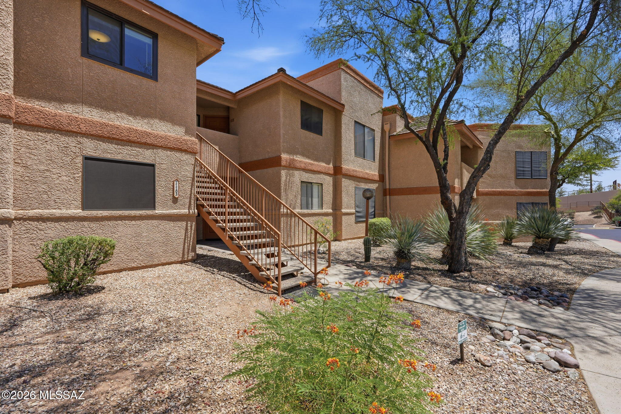 Gorgeous condo in the heart of the Foothills! Meticulously updated 2BR/2BA upstairs unit features newer cabinetry, granite countertops, stainless steel appliances, and open concept shelving. Both bathrooms have been completely remodeled and the primary bath has a walk-in shower and floor to ceiling porcelain tiles. All the windows have been replaced and the HVAC was new in 2019. This is resort style living in the gated Villas At Sabino Canyon. Live close to world class hiking, biking, restaurants, shopping & golf. Community amenities include a gated entry, upgraded Pebble-Tec pool & spa, workout facility, and covered parking. Catalina Foothills School District #16 too! Don't miss this condo if you are looking to live the Foothills lifestyle. See Special Features List under documents.