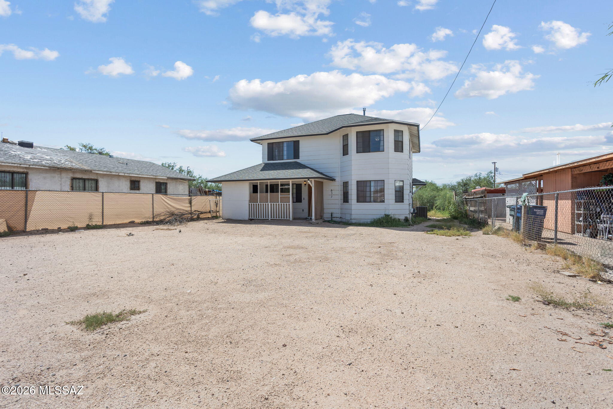 Fantastic starter home opportunity on Tucson's west side! The ground floor provides a spacious kitchen and living room, large bedroom w/ semi-private bath, separate laundry area and plenty of storage. Upstairs features include a primary bedroom with en-suite bath, 2 more spacious bedrooms and add'l hall bathroom. Large lot offers plenty of off-street parking, or as a blank canvas to be added onto. Convenient to I-10 @ Grant Rd, and less than ¼ of a mile from Tucson's newest tourist attraction: Casino del Sol - Vahi Taa'am, opening this November! Perfect for an economic home purchase or as a sensible rental property in the ''path of progress.'' Don't sleep on this one: schedule your showing today!