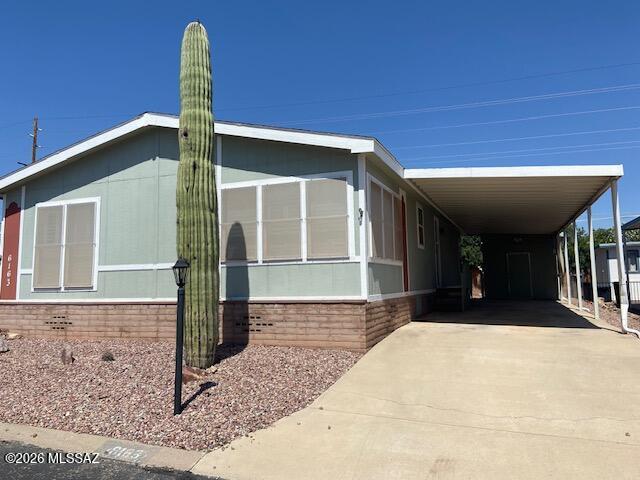 3 bedroom and 2 bath manufactured home built in 1994.  Over 55 community.  Nice sized kitchen with breakfast bar and dining area.  Good sized living room and a laundry room.  2 carport includes a good sized storage shed.  Community pool.  HOA includes water.  Home needs some TLC but lots of value here.  Take a look.