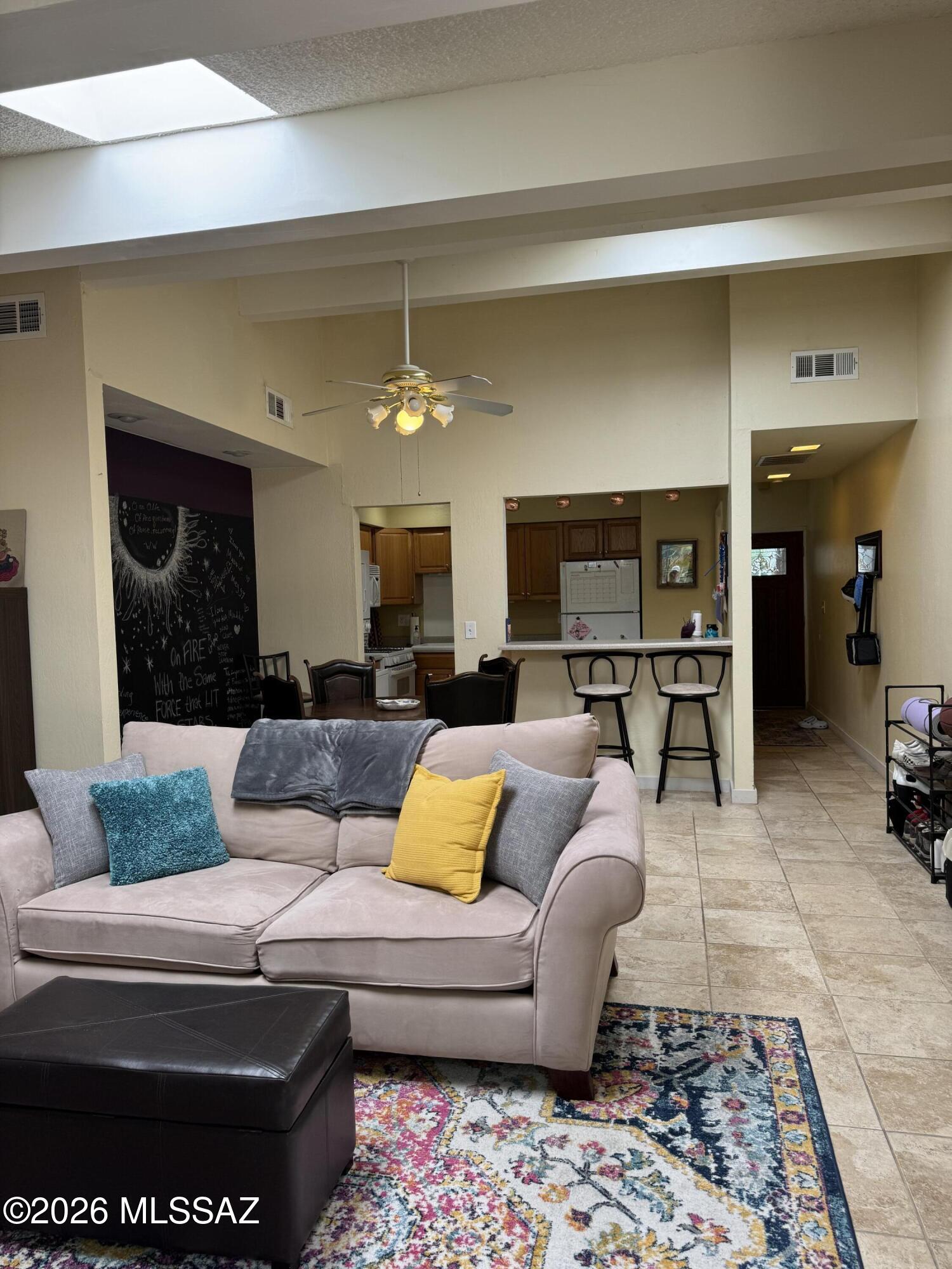 Unit 14 PRICED TO SELL!  GREAT OPPORTUNITY TO OWN IN THIS RENTAL FRIENDLY COMMUNITY!  new hot water heater just installed 2 Story Unit, 1108 SF, 2 Bedrooms, 2 full bathrooms with the owners suite getting a new toilet just installed, Kitchen open to the Dining Room & Family Room.  access to community common area with green grass, trees, & community pool! HOA COVERS SEWER/WATER/TRASH, ROOF, EXTERIOR & COMMUNITY AREAS! Walking distance to The Tucson Racquet Club, the Rillito Loop for walking/biking, across from the iconic Winterhaven neighborhood, close to UA, TMC, & MORE!