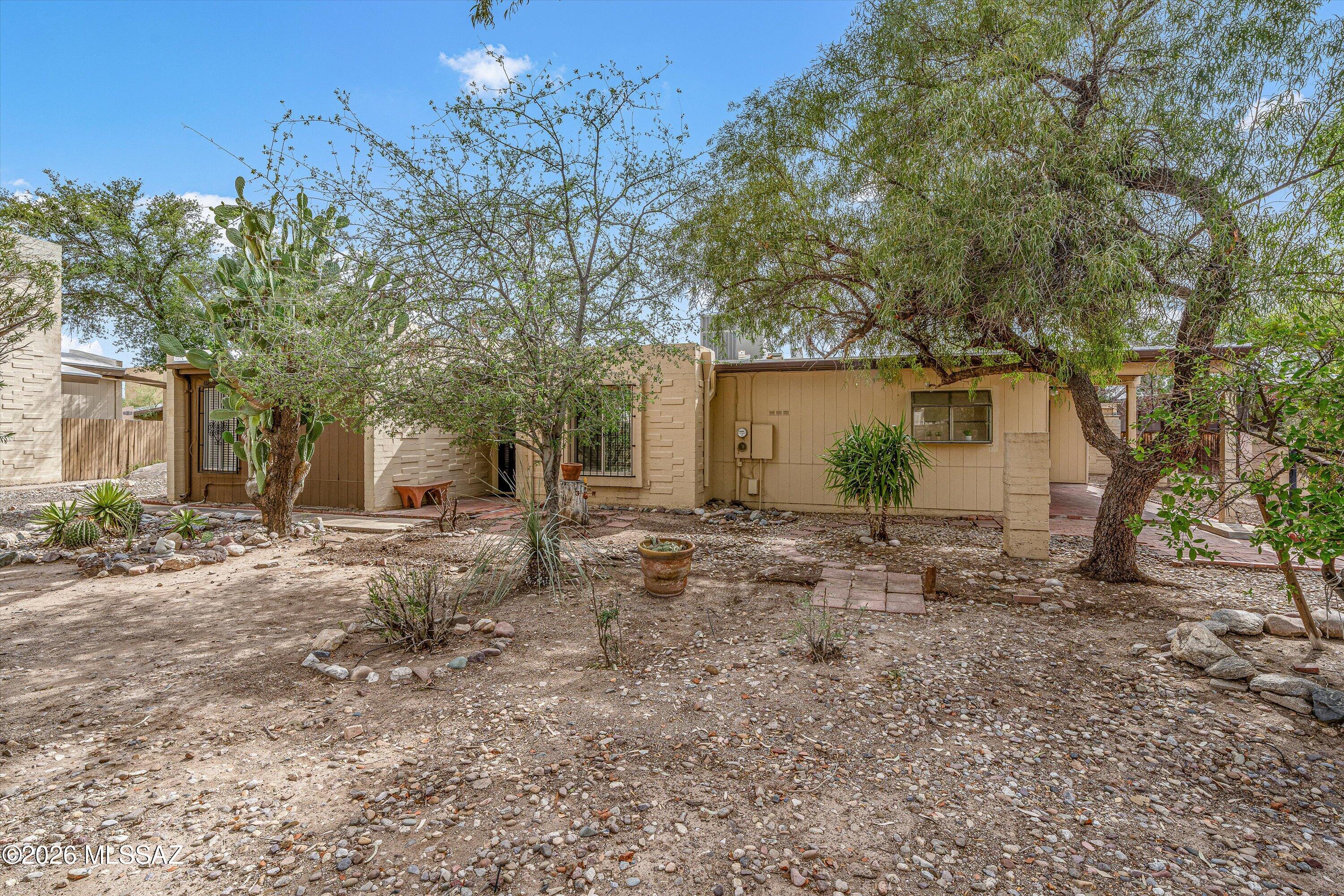 You'll want to see this - location - near The Loop, shopping, Sabino Canyon and more - check!  2 year old hvac - check!  Refreshed with fresh paint, new fridge and dishwasher, new carpet in the bedrooms, and lots of touches you'll love - check!