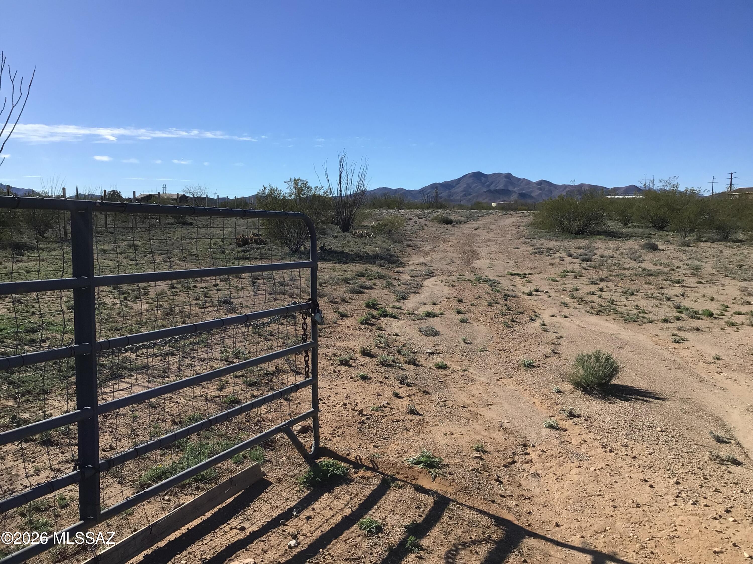 Discover an outstanding chance to own 3.25 acres of mostly flat, beautifully vegetated land located in the sought-after Rincon View Estates of Vail, Arizona. This premium parcel is fully fenced and ideally situated on a paved road, free from HOA restrictions. Enjoy unobstructed mountain views in every direction, offering a remarkable setting for your future plans.
Just 1.5 miles from I-10, the property offers seamless access for commuting, providing convenience for daily travel while maintaining privacy and rural tranquility. With ample space and flexibility, this parcel is perfect for a variety of uses--enjoy the best of both worlds: easy commuting and a peaceful retreat, whether you are planning your dream home or a private getaway.