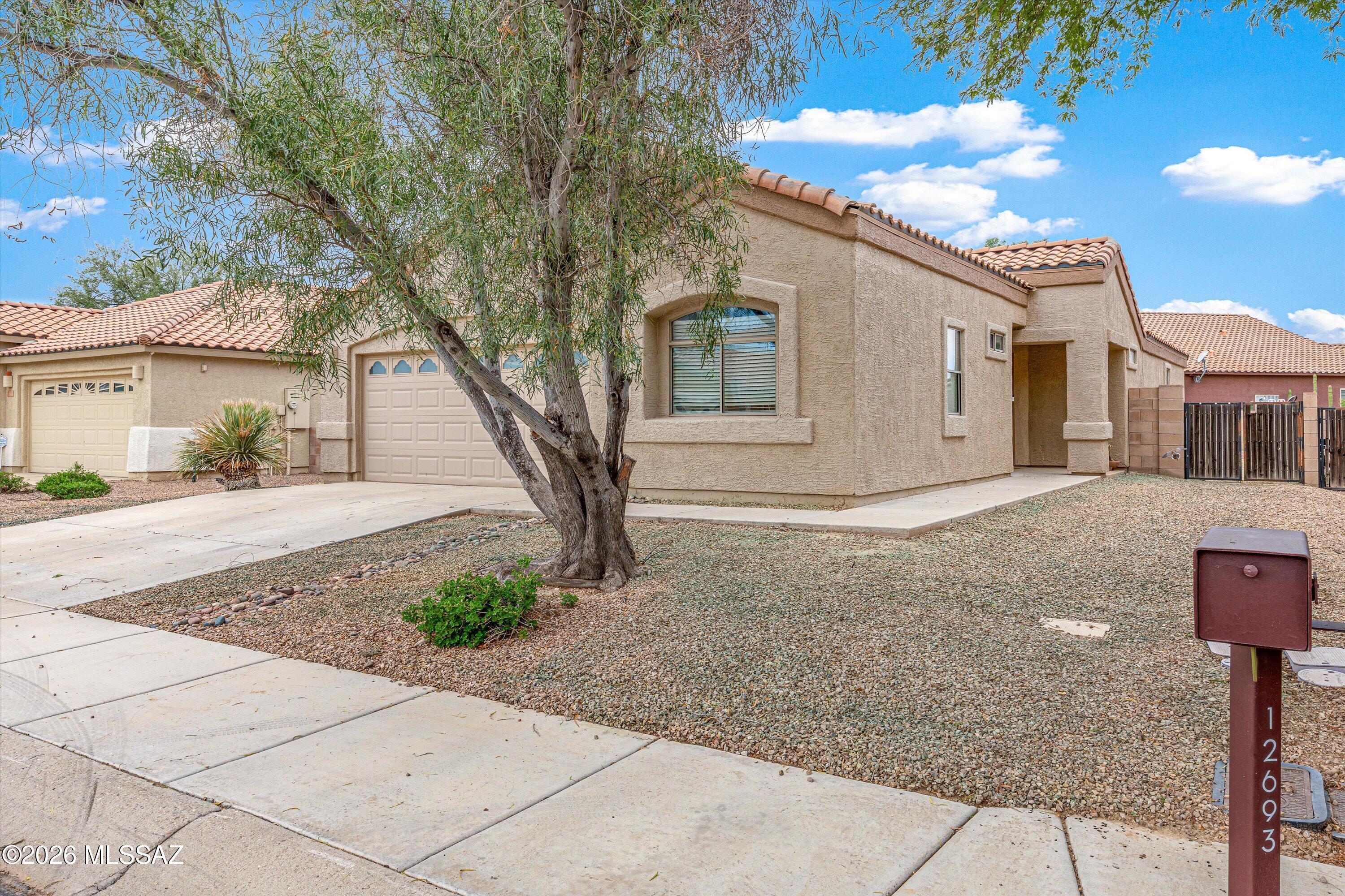 LENDER OFFERING 2/1 RATE BUY DOWN!! Welcome home to 12693 N Fallen Fence Lane, located in the desirable Gladden Farms community of Marana. This inviting single-story home offers approximately 1,601 square feet of comfortable living space with a functional, open layout designed for easy everyday living and entertaining. Natural light fills the home, creating a bright and welcoming atmosphere throughout. Step outside to a private backyard with plenty of potential for relaxing, entertaining or creating your own desert retreat. Conveniently located near neighborhood parks, schools, shopping, dining and I-10 access, this home offers the perfect combination of comfort, convenience and community. Come experience all that Gladden Farms has to offer and make this Marana home your own!