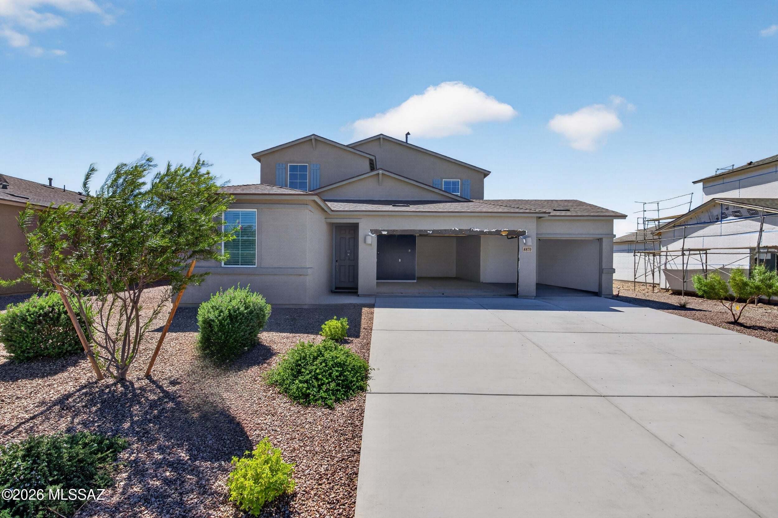 Built in 2024 and loaded with upgrades, this 4 bedroom, 2.5 bath home offers 2,208 square feet, a flexible den/office, and stunning mountain views from both the front and back. Enjoy Arizona sunshine and desert sunsets with a wonderful sense of privacy. The open layout flows into a kitchen with granite counters, stainless appliances, a big island, and a built in pantry with plenty of storage. Stylish bathrooms feature fresh, elevated finishes throughout. The easy care backyard is perfect for relaxing or entertaining, and the rare 4 car garage has room for all your vehicles and desert toys. Copper Ridge Elementary is right inside the community, part of Vail's award winning school district. Come see it today!