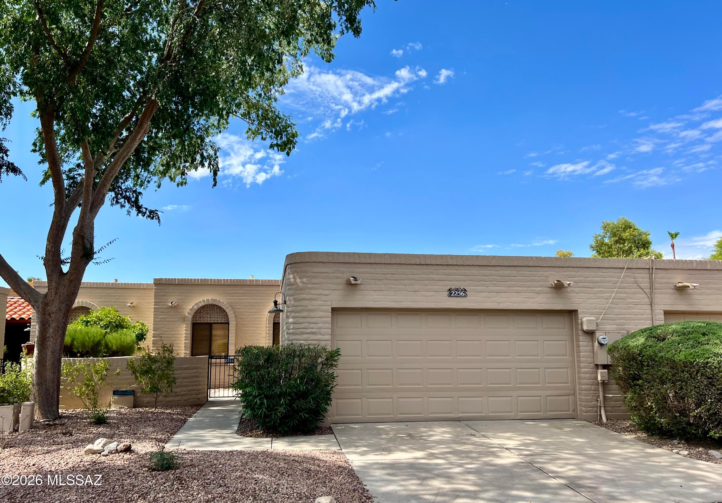 This beautifully maintained unfurnished townhome ideally located near the University of Arizona, Banner Hospital, banks, restaurants, retail, and more. A 12-month lease or longer is preferred, with future extension options available. The inviting great room features a cozy fireplace, perfect for cooler evenings, and opens to a private patio with both covered and uncovered areas for year-round enjoyment. The spacious primary bedroom includes a generous walk-in closet. All major appliances are included for your convenience, along with a two-car attached garage offering direct access. No pets allowed.