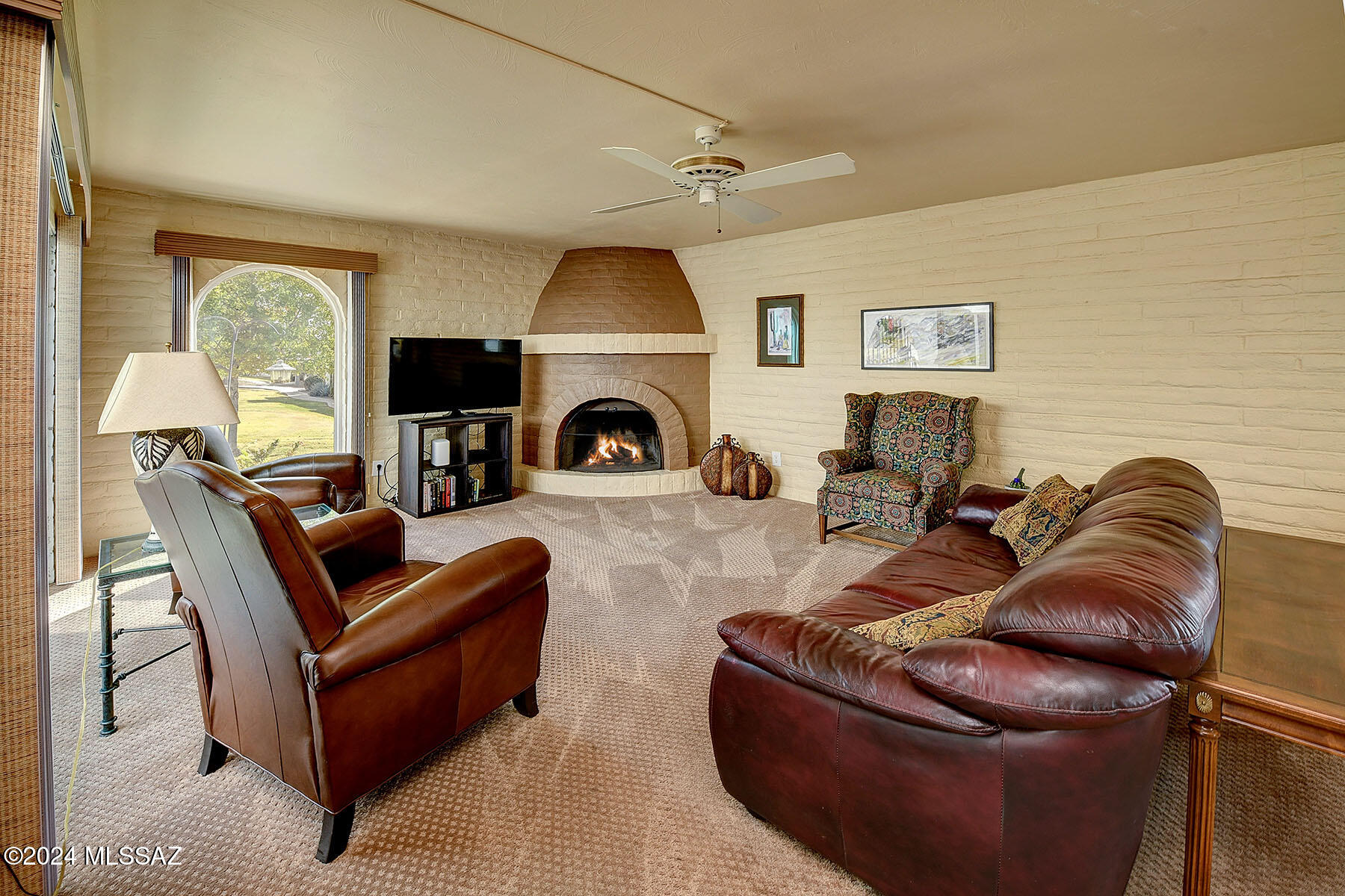 OPEN SUN 6/14, 2-4! SUCH A CUTE & COZY, FULLY FURNISHED 2 BR/ 2BA CONDO IN CASITAS DE CASTILIAN, AN OVER 55 HISTORICALLY DESIGNATED COMMUNITY DESIGNED BY RENOWNED ARCHITECT BENNIE GONZALES SITTING ON 17 ACRES OF LUSH COMMON AREA. SOLID MASONRY CONSTRUCTION, CUSTOM BEEHIVE FIREPLACE, FRONT/ BACK PATIOS, LOTS OF ARCHED WINDOWS & SKYLIGHTS, REMODELED MSTR BATH, NEW DUAL PANED WINDOWS & DOORS PLUS A LOVELY VIEW & POSITION IN COMMUNITY. ENJOY THE TWO POOLS (ONE LAP POOL HEATED YEAR-ROUND), TENNIS COURT & CLUBHS WHICH OFFERS ACTIVITIES, POTLUCKS & HAPPY HOURS. HOA FEE COVERS ALL THESE AMENITIES PLUS WATER, TRASH PICKUP, MAINTENANCE OF STREETS, GROUNDS & BUILDINGS & BLANKET POLICY INSURANCE. THIS SPECIAL HOME COMES WITH ALL THE FURNITURE, POTS/ PANS, LINENS & ARTWORK (IF WANTED). MOVE IN READY!