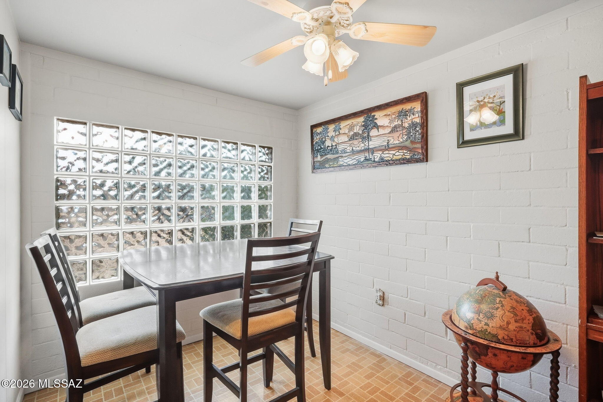 Range Priced $275,000.00 to $285,000.00 U-of-A just Minutes Away! 
RATES ARE UP-WE'VE GOT YOU COVERED! ''Seller is offering a 1-year rate buydown through a preferred lender at close of escrow''
*Recent Upgrades include a New Roof, New  HVAC, New Windows, New Exterior Doors.*

Welcome to this charming mid-century brick home, perfectly situated on the peaceful west side just minutes from downtown, the University of Arizona, shopping, dining, and entertainment. Step into an inviting space featuring a cozy rock fireplace. 
The spacious kitchen offers ample cabinetry  and the bedrooms provide flexibility for guests or home office. Convenient Location, Peace of mind and Fireworks from A Mountain this classic Southwest charmer has a lot to offer with an R2 Lot, you can add a Casita or ADU!