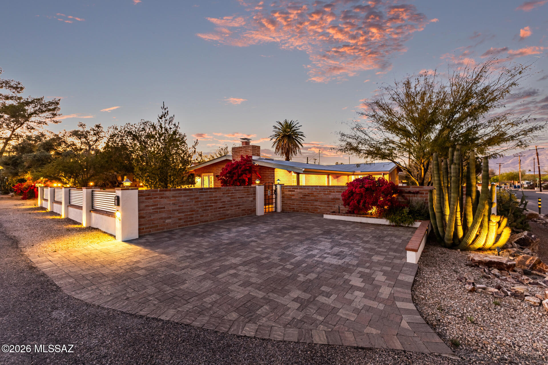 Bring your Backup offer for this MLS Tour Winner, located In coveted Miramonte, this exquisitely renovated burnt adobe residence blends timeless Tucson architecture with elevated modern design. Reimagined in 2019, the home features dramatic beamed ceilings, a designer barn door, elegant French doors, and a spa-like bath with a luxurious soaking tub. A private courtyard entry creates a warm, secluded welcome, while the enclosed garage and metal roof add convenience and lasting quality. Ideally located with close access to the University of Arizona, this distinctive home offers charm, sophistication, and an exceptional central Tucson lifestyle.