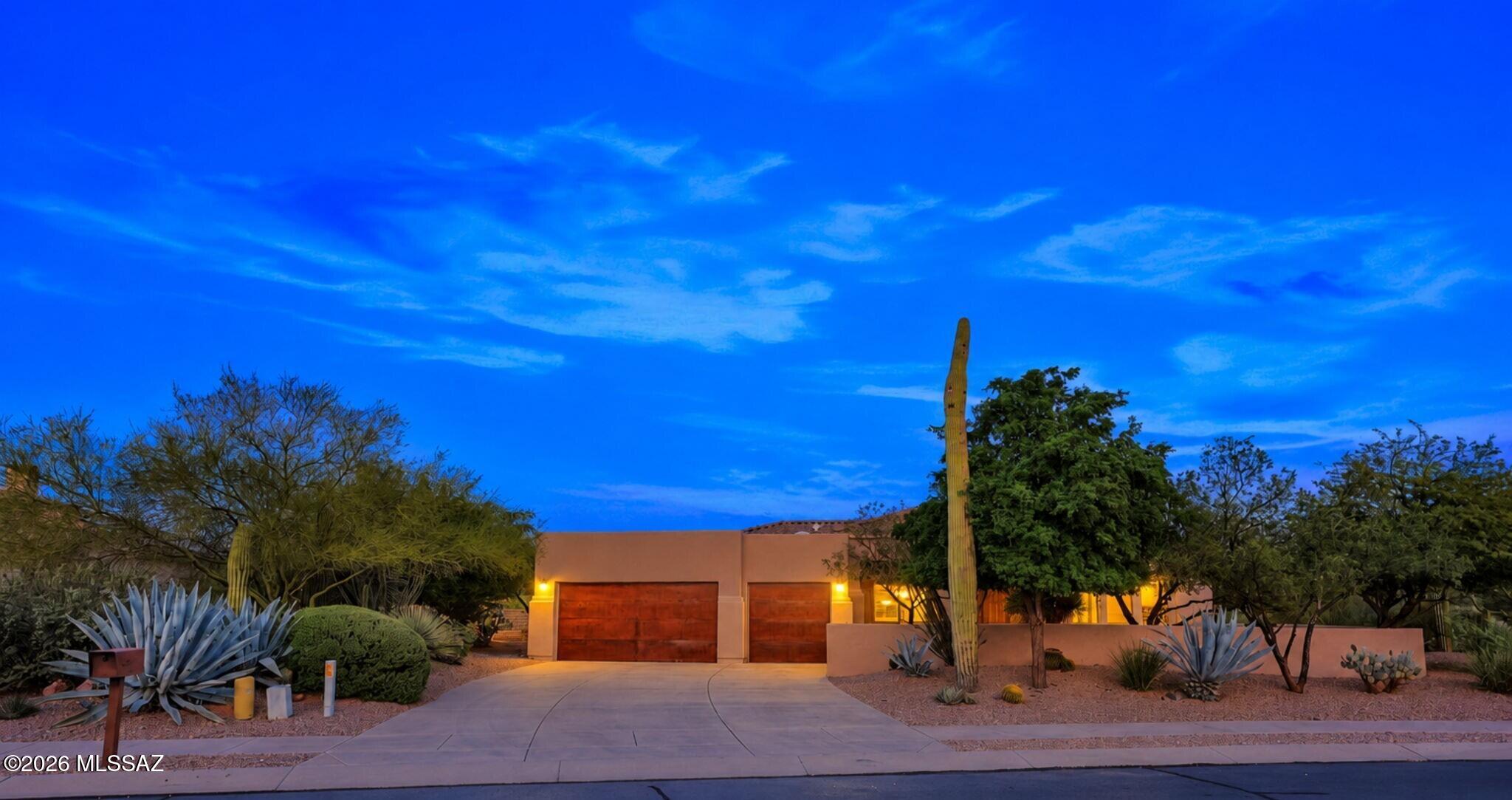 Exceptional 4-bed, 4-bath with a private den in the sought-after Oro Valley Community! Designed for comfort and privacy, this home features an additional ensuite, offering flexibility and space for multi-generational living or guests. From nearly every angle, you'll enjoy panoramic views of the iconic Catalina Mountains that create a breathtaking backdrop day and night. Situated in a quiet neighborhood complete with sidewalks and a community park, this home delivers the balance of peaceful living and everyday convenience. You're just minutes away from shopping, dining and excellent schools. Beautiful landscaping frames the property, while a large front courtyard invites outdoor relaxation. A spacious 3-car garage completes this rare opportunity to experience desert living at its finest.
