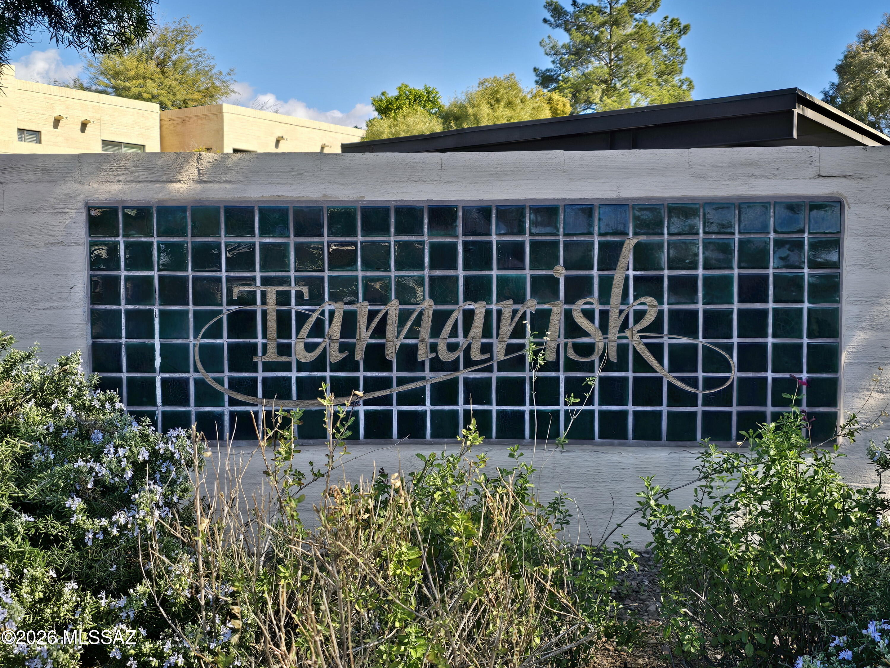 Location, Location, Location! Charming Tamarisk Townhome near Prince/Country Club is on the Treat Bike Path, a short walk to the Loop and to the Tucson Racquet Club, and adjacent to the Rio Vista Natural Resources Park. Plus, convenient to Banner Hospital + U of A. Freshly painted 1st Floor Great Room w/ beehive fireplace, dining area & Kitchen w/ all appliances and adorable breakfast area w/ bench seating. Powder bath. Tile flooring downstairs; beautiful Luxury Vinyl Flooring on stairs + bedrooms. 2 Generous bedrooms - each with an ensuite bath. Primary bedroom boasts a fireplace & 2 closets. Private front courtyard w/ Mature Citrus & large Back Patio with high walls for privacy and room to entertain. This home is special!  HOA fee includes Personal Water/Sewer + Pool/Spa