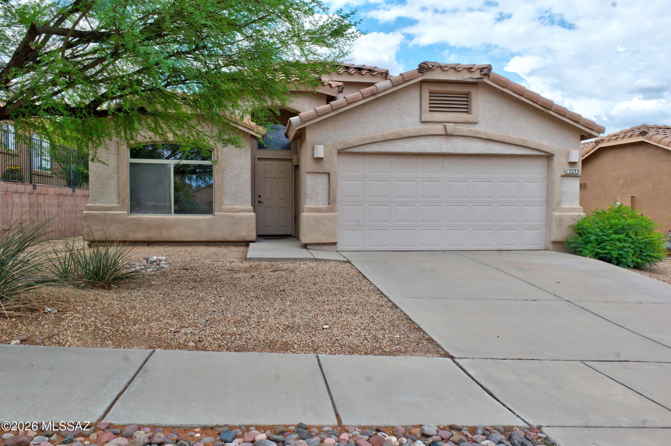 Move-In Ready Rancho Del Lago Retreat! Welcome home to this beautiful, single-story residence in the highly sought-after Rancho Del Lago community of Vail, AZ. Offering 1,812 square feet of thoughtfully designed, open-concept living space, this 4-bedroom, 2-bathroom home perfectly blends modern comfort with desert efficiency. The spacious Great Room flows seamlessly into a bright and inviting kitchen, which boasts striking granite countertops, a gas range, a deep walk-in
pantry, and plenty of prep space for the home chef. The primary suite serves as a relaxing retreat, complete with a generous walk-in closet and a private en-suite bathroom. Three additional well-appointed bedrooms provide flexible space for
guests, a home gym, or a remote workspace. Step outside to your private, block-walled backyard engineered for low-maintenance living. With a covered patio and easy-care desert landscaping, it is the perfect spot for morning coffee or evening entertaining. Complete with central A/C, durable tile and carpet flooring, and an
attached 2-car garage, this home is truly turnkey. Located in a fantastic neighborhood with mountain views and easy access to local amenities. Don't miss this incredible opportunity--schedule your showing today!