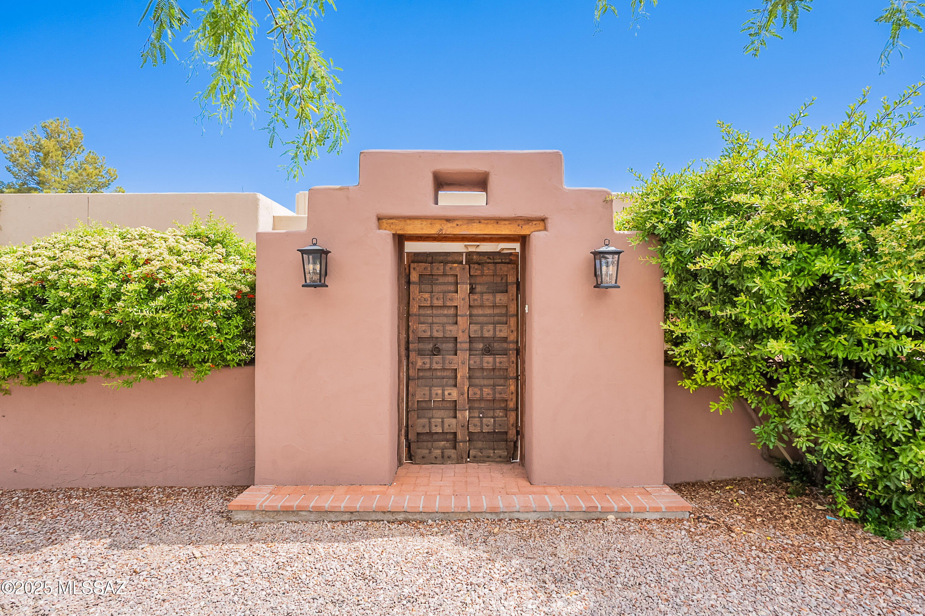 Motivated Seller!  Welcome to much desirable Tubac Golf Resort Community!  Discover unparalleled elegance and comfort in this stunning home, featuring an enclosed courtyard and a fully landscaped rear yard perfect for outdoor enjoyment.  Abundance of natural light streaming through skylights, illuminating the beautiful Saltillo tiles and exposed bean ceilings. The primary suite offers a serene retreat with a cozy sitting room, providing a perfect spot to unwind. Enjoy year-round comfort with a zoned, newer HVAC system ensuring optimal climate control throughout the home. This property seamlessly blends luxury and practicality, making it an ideal sanctuary for those seeking both style and functionality. Make this home yours today!