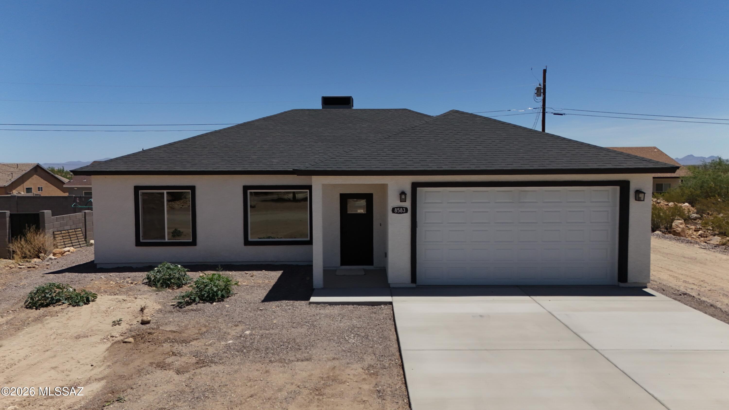 Quality-built and never lived in, this beautifully finished site-built home has been fully inspected and is ready for its first owners. Designed with both comfort and efficiency in mind, the 3-bedroom, 2-bath split floor plan offers excellent use of space, generous storage, and tasteful finishes throughout. Energy-saving features include spray foam insulation and Low-E windows, helping provide year-round comfort and efficiency. Elegant lighting and plumbing fixtures add a refined touch, while the builder's 2-year warranty offers additional confidence in the home's craftsmanship. Situated at the base of Mt. Graham, the property enjoys stunning mountain views and convenient access to hiking, camping, fishing, and more -- all just minutes from Safford.