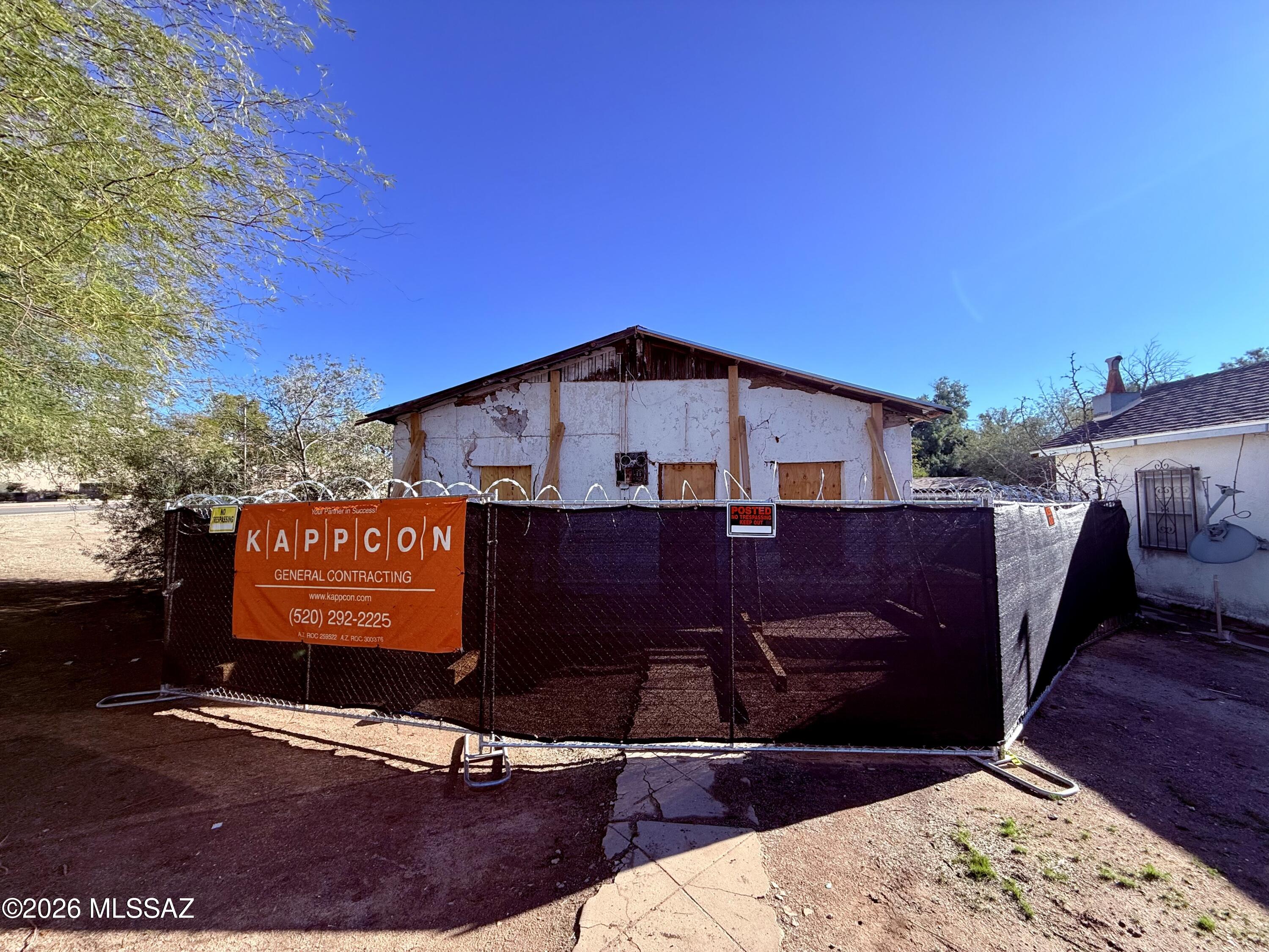 Rare 11,000 sq ft development opportunity in the heart of Tucson's historic Barrio Viejo, now offered at $299,000! Generationally owned by one of the original Barrio Viejo families, this presents an ideal investment and redevelopment opportunity with HR-2 zoning allowing up to two single-family homes with potential ADU. Possible lot split may create additional development potential; buyer to verify with City of Tucson. Prime location near El Minuto, Tucson Convention Center, Mercado San Agustín, Downtown, 4th Ave, and The Loop. Property includes century-old adobe structure sold AS-IS. Structure unsafe and not habitable. City stop-work order in place; entry prohibited. Buyer responsible for due diligence and compliance with Barrio Histórico (HPZ) guidelines.