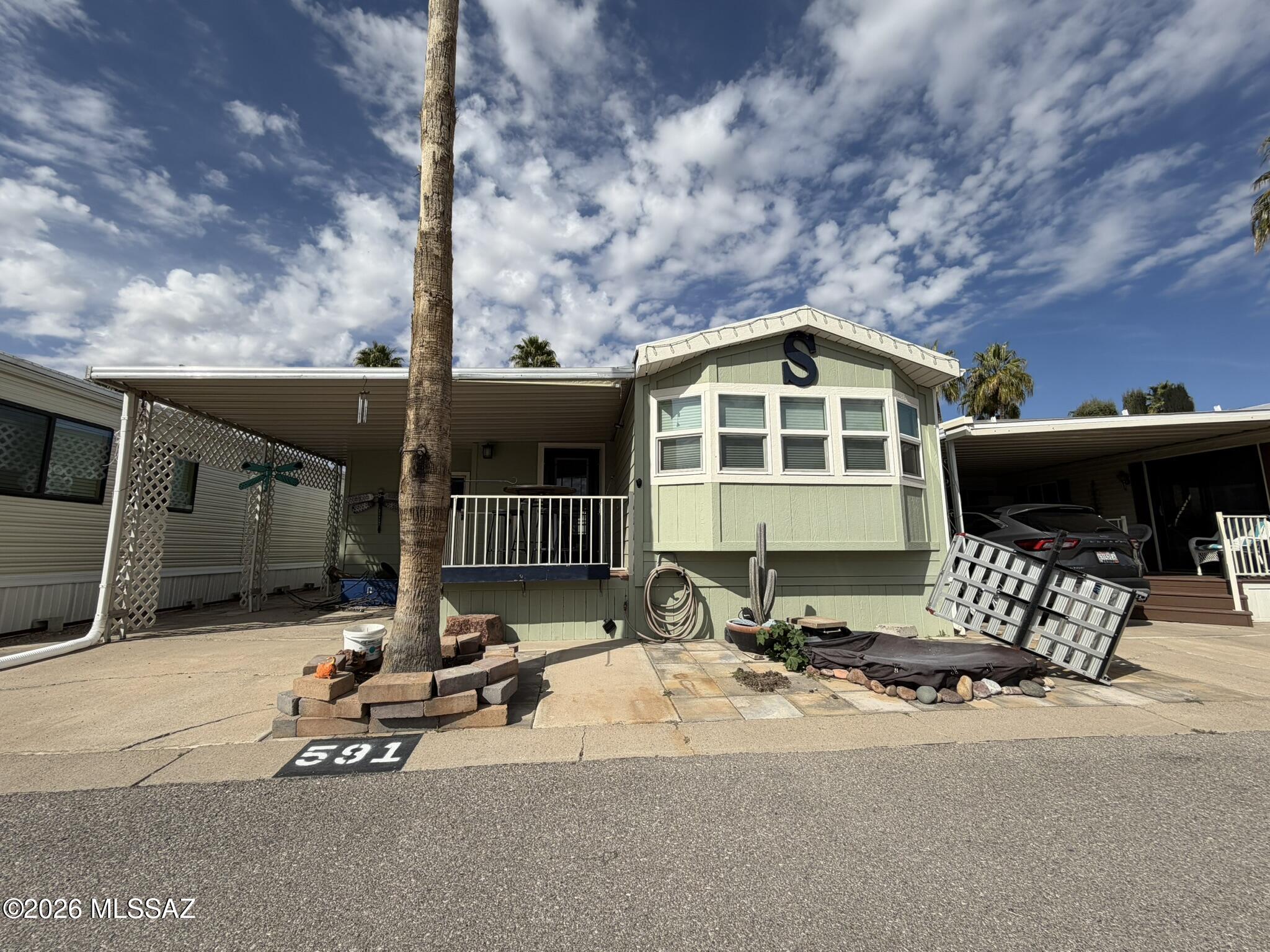 Elegantly updated 1 bed/1 bath +den home in a gated, active, age restricted & pet‑friendly community offering resort style amenities. This beautifully maintained residence blends comfort & sophistication w/ double pane windows, top-down blackout shades, built in cabinetry, a tankless water heater, water softener, & reverse osmosis in the kitchen.

The home has an inviting entrance foyer, den & open living areas create flexible spaces for relaxing, working, or hosting. The kitchen opens seamlessly into the living room, where the space has been plumbed for a future gas fireplace.

Outside, enjoy a charming front covered patio, perfect for morning coffee & easy conversations while the private back deck offers a quiet retreat for unwinding. Low care landscaping includes 18x18 pavers, thoughtfully placed planters & pond which enhance the outdoor living experience. The attached insulated shed doubles as stoarge and a convenient laundry room. Community amenities include a pool, spa, pickleball, shuffleboard, athletic facilities, numerous craft and project rooms, a vibrant social scene, and so much more. Buyers must qualify with the community.