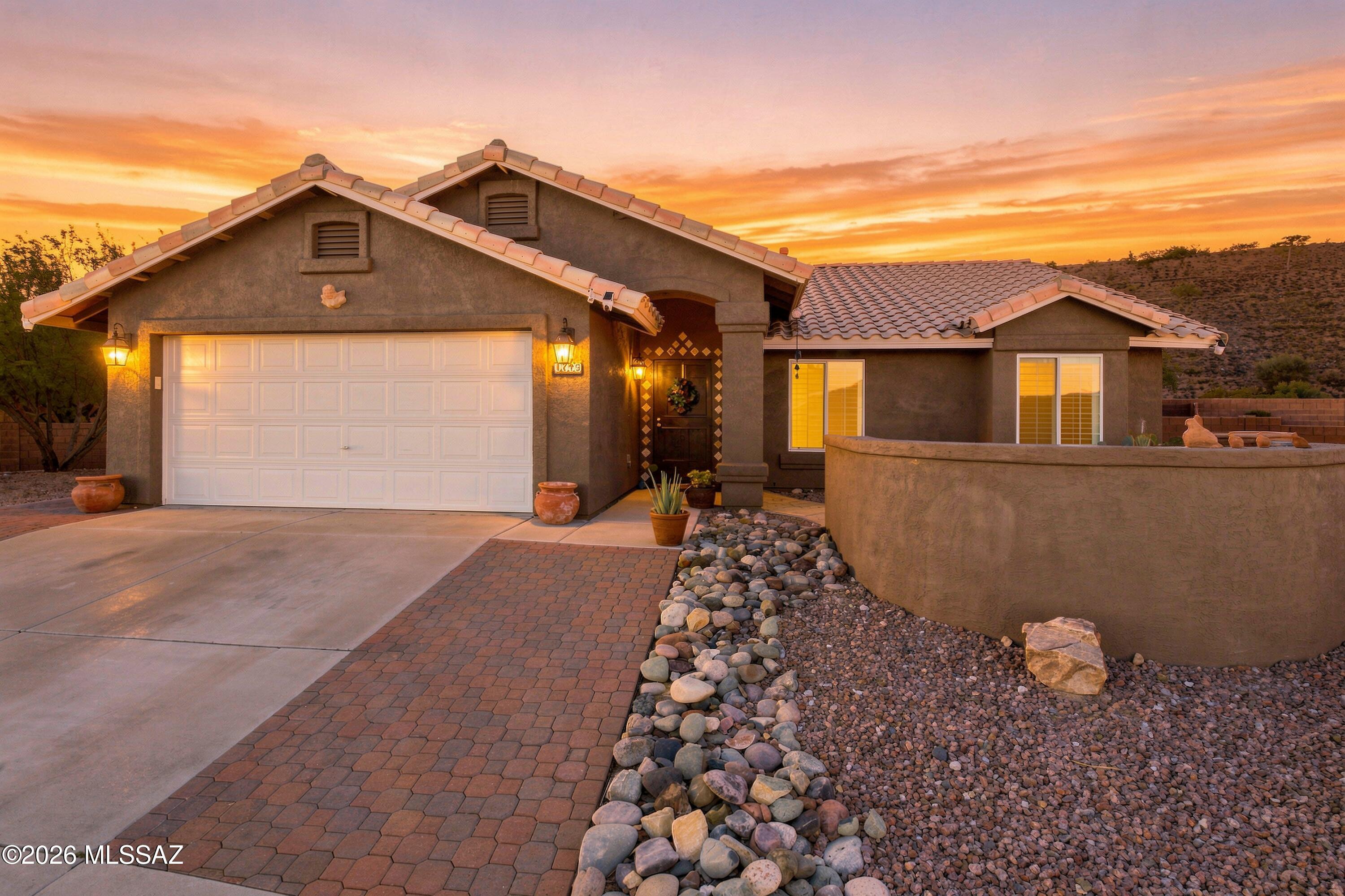 Welcome to your own private resort retreat! Beautifully updated 3-bedroom, 2-bath home ideally situated at the end of a cul-de-sac with no rear neighbors, offering privacy and a peaceful setting.

Step inside to discover a stylish, move-in-ready interior featuring wood-look plank tile flooring throughout, fresh interior finishes, and thoughtful updates throughout the home. The kitchen has been beautifully remodeled with new cabinetry, countertops, fixtures, and modern finishes, creating a fresh and inviting space for everyday living and entertaining. Both bathrooms have also been remodeled with elegant stone finishes and multiple shower heads, creating a relaxing spa-like experience right at home. New ceiling fans throughout add comfort and style. The true showstopper is the fully renovated backyard, designed to feel like a private resort. Enjoy the sparkling pool surrounded by beautiful pavers, low-maintenance turf, and multiple waterfall features flowing into the pool, creating the perfect atmosphere for relaxing or entertaining. The thoughtfully designed outdoor space provides plenty of room to lounge, dine, and enjoy Arizona's beautiful weather without the maintenance of a traditional lawn.

Additional updates include fresh exterior paint and numerous modern improvements throughout. With its resort-style backyard, remodeled interior, privacy, cul-de-sac location, and low-maintenance landscaping, this home offers the perfect combination of comfort, style, and indoor-outdoor living.

Come experience the resort lifestyle for yourself--this one is truly move-in ready!