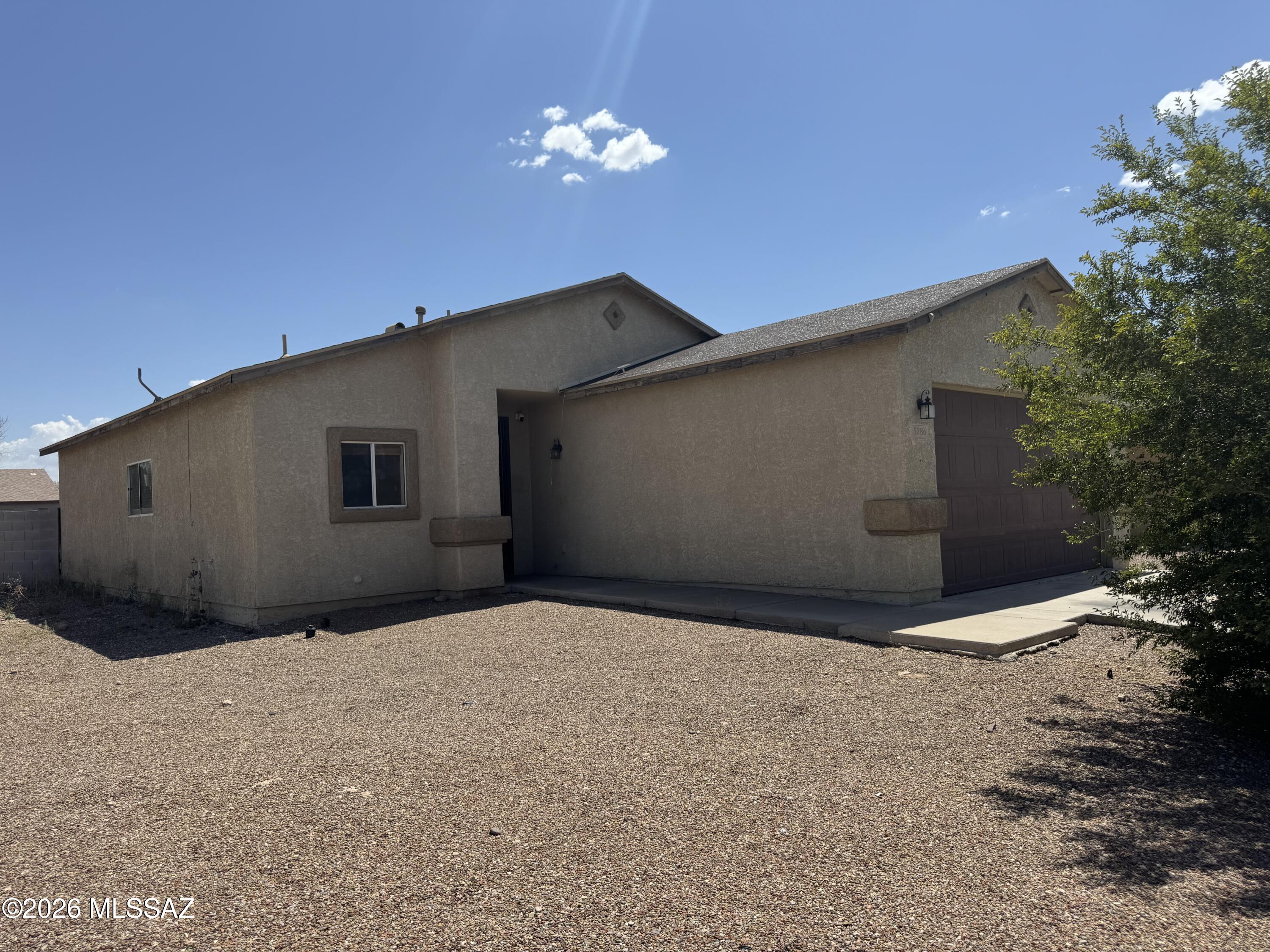 Welcome home to this 3B/2Bath corner property that's close to stores, restaurants and I-10. Open floor plan with all tile floors, updated AC Unit, water heater and garage door.  Priced to sell quickly, make this one yours today!