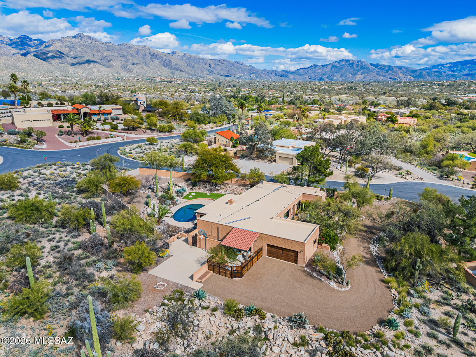 Private 4BR/3BA + Studio Home on  .96 acre lot. Stunning updated gourmet kitchen with quartz counters, generous storage including a huge pantry, stainless appliances, open & light. Enjoy 4 intimate patios of outdoor dining, and relaxing, Newer Custom Andersen windows, frame serene desert landscape. Refreshing PebbleTec party pool is heated and updated  for lovely outdoor entertaining. Primary BR has 2 walk in closets, builtin dressers and seperate sink area custom blt updates & quartz counters in baths. Fireplace in Family room. Freshly painted interior bright & crisp coastal decor with Southwest contemporary Territorial Finish.
Wonderful Community pool  with Swim team available. Welcome to a gracious Home and lifestyle in a desired location!