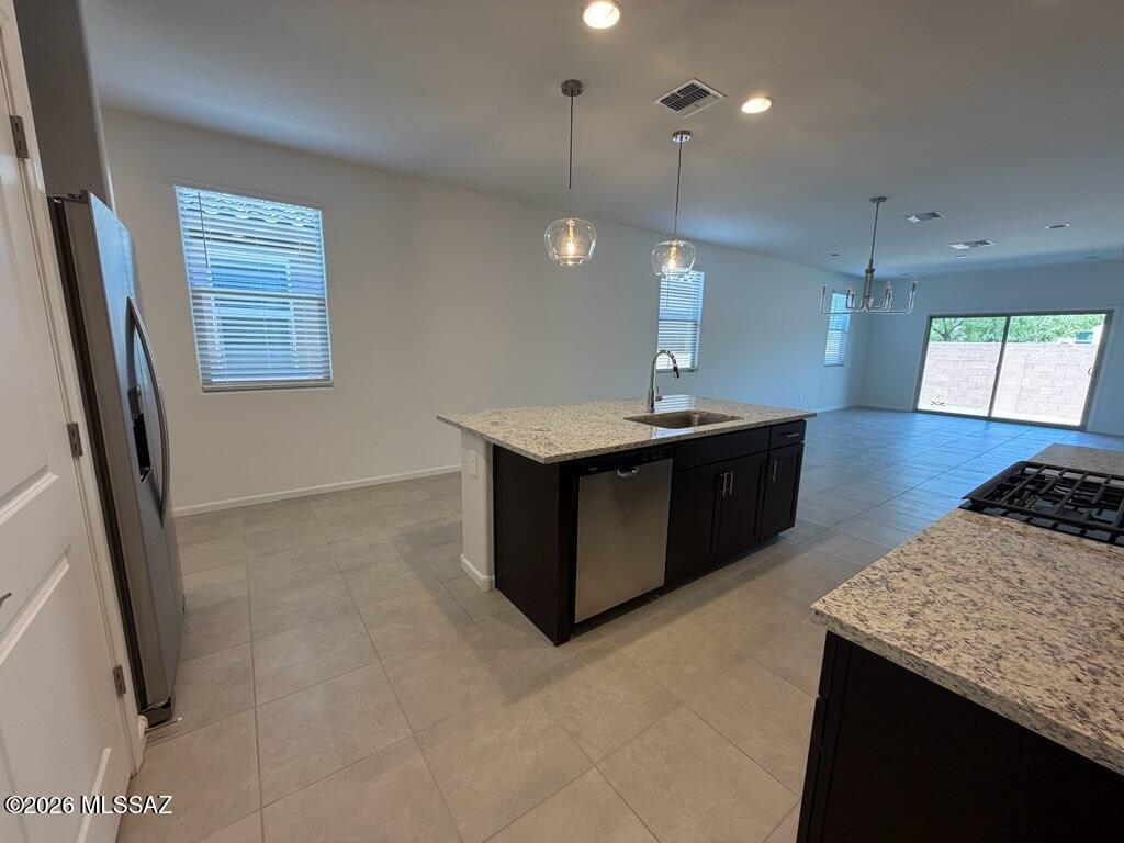 Spacious. Energy Efficient. Move in Ready.

SPACE STYLE COMFORT
The Opal floorplan offers a spacious open-concept layout with 4 bedrooms and 3 bathrooms, perfect for modern living. The private primary suite is a true retreat, featuring an oversized walk-in closet. A well-designed kitchen with a walk-in pantry provides plenty of storage for everyday needs. Located in the Summerstone community in Marana, near Continental Ranch, with easy I-10 access to Marana and Northwest Tucson. Enjoy nearby outdoor destinations like Saguaro National Park, El Rio Preserve, and the community park. Move-in ready with washer, dryer, refrigerator, and whole-home blinds included.