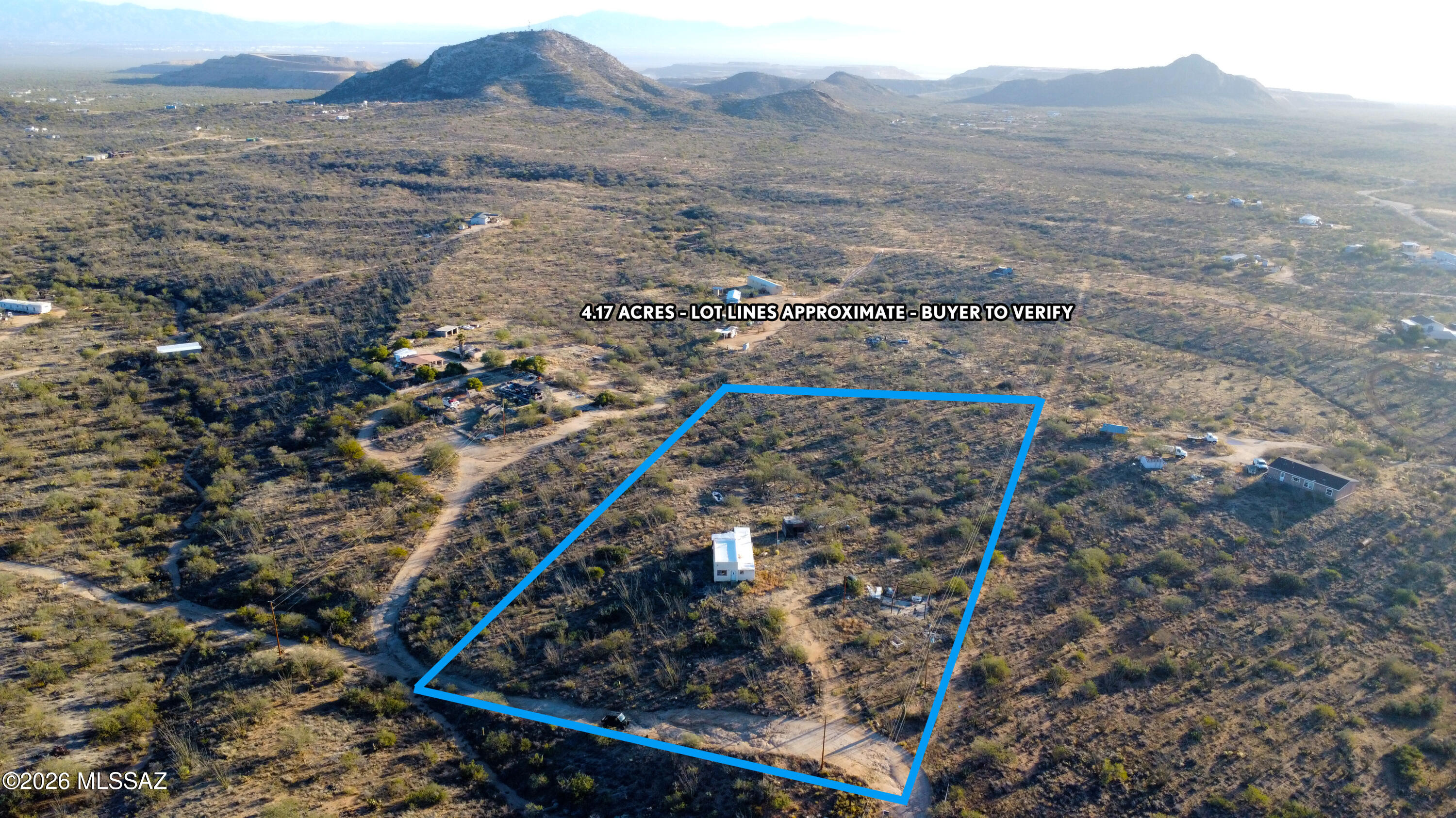 This is a great partially developed parcel being sold at raw land value. Electricity is on site. Well has been drilled (see state database records). Records also show septic system is present. The buyer will be responsible for testing all utilities (including required septic certification).  The structure on site has extensive deferred maintenance (weather/rodent damage). It is not currently inhabitable. This property CANNOT be financed, but cash or hard money loans will be considered. The dwelling is in scrap condition, is not affixed, and no title can be located. Being sold AS IS. Estate will not make price adjustments after contract acceptance, so buyer should perform all inspections prior to making an offer.