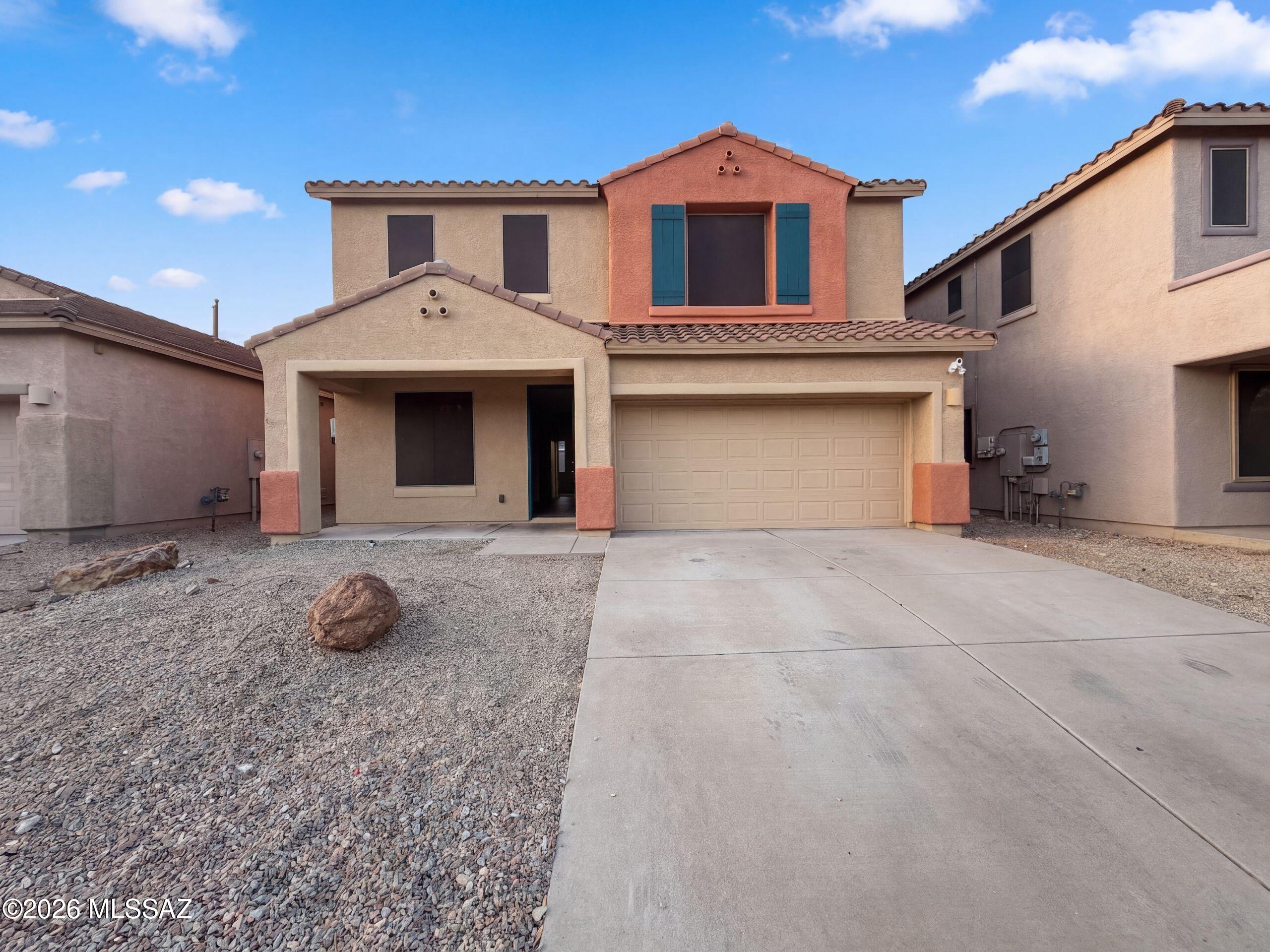 INCREDIBLE BUYER INCENTIVES: $6,000 MORTGAGE CONCESSION. Seller will pay up to $6,000 at closing towards your interest rate buydown if you finance with lender of sellers choice.

12512 E Rust Canyon Pl is a 2-story Vail home with 5 bedrooms, 3 bathrooms, 2,601 square feet, and a 2008 build year on an approximately 4,950-square-foot lot. The kitchen features blue cabinetry, an island, stainless appliances, tile flooring, and recessed lighting. The living area offers wood-look flooring, windows, and an open layout. Bedrooms include carpeted or wood-look floors, windows, and closet storage, while bathrooms feature vanities, a soaking tub, and tiled shower surrounds. Outdoor spaces include a rear patio, lawn, block fencing, and paver areas. A two-car garage provides parking and storage. Incl