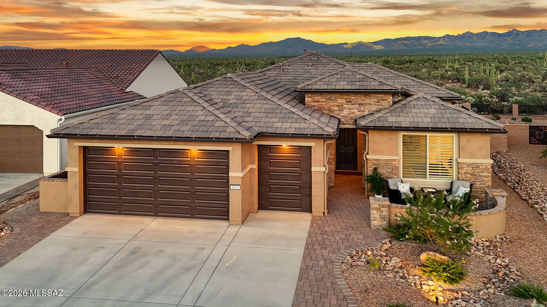 Mountain Views with No Rear Neighbors in Quail Creek Resort! Wake up to unobstructed mountain views from one of the rare lots that backs to open desert instead of another home. No one will ever build behind you, just endless desert, mountain silhouettes and ever changing skies painted with clouds, rainbows, lightning and glowing sunsets. This move in ready gem is less than a year old, with landscaping, appliances and finishes already in place, so you can start living the lifestyle immediately instead of waiting to build. The Agave model delivers just the right size at 1,760 sq ft, 2 bedrooms, a den, 2.5 baths and a 2.5 car garage extended by 4 ft for extra storage or workspace. Tile flooring flows throughout, no carpet anywhere. Additional upgrades include a whole house water filtration system, plantation shutters, a water feature, epoxy garage flooring, utility sink and tankless water heater. With an acceptable offer, it can even come completely furnished, so you can move in and start living the lifestyle from day one. Quail Creek Resort is a Robson community for active adults offering resort style living at its finest, complete with its own golf course, restaurant and a full calendar of social clubs and activities, all under nearly 300 days of Southern Arizona sunshine a year.