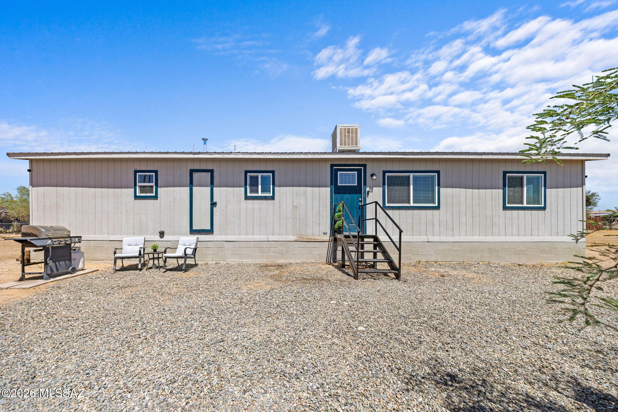 Seller shall entertain or counter offers between $200,000 and $225,000. Make sure you see this charming home featuring two bedrooms, a full bathroom, and an open floor plan. This Manufactured home is located in Marana on 1.01 Acres with natural desert landscape, no HOA & endless possibilities. The private gated driveway leads to the home, offering ample parking. Step inside this light-filled, move-in-ready manufactured home. As you enter the large living area you will see the vinyl plank flooring throughout, which flows into the open Kitchen. This fully functional Kitchen is complete with plenty of newer cabinets, granite countertops and an island/peninsula with seating for dining and extra storage. The owner's suite features plenty of natural light and a large closet. With a split floor plan, there is also an additional guest bedroom and a guest bath, featuring a shower/tub combo in the hallway for your convenience. The guest bedroom has a door for bathroom access and could become the primary suite.Enjoy this home, which offers true privacy in the heart of Marana. Enjoy calming mountain views with panoramic sunrises & sunsets from your completely fenced backyard. It is located just 20 minutes from the I-10 and offers unlimited outdoor space with established trees. Bring all your toys, such as RV, ATV, and boat there is plenty of space! And remember no HOA restrictions. The home comes with a metal roof and a new AC system installed in August 2025. There is a fully functional evaporative cooler also, if that is what you prefer. Also you will love the energy efficiency of the new windows throughout.
What are you waiting for? Make the call today!