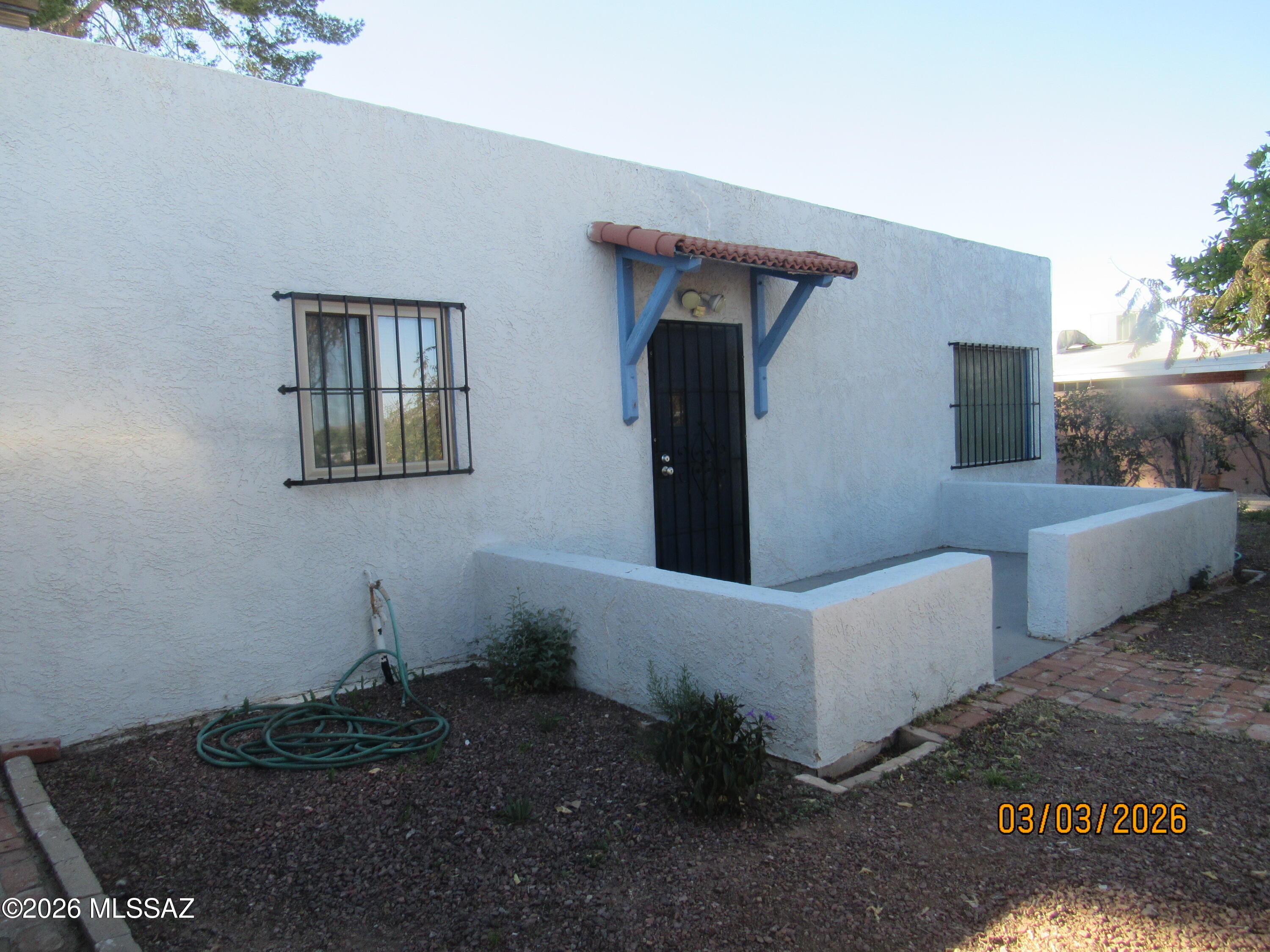 Welcome to a well-kept home built in 1954.  Features two bedrooms, one full bath, a single car carport, large dining room with plenty of storage, good-size kitchen, electric range and oven, refrigerator, evaporative cooler, great back yard all fenced in, trees.