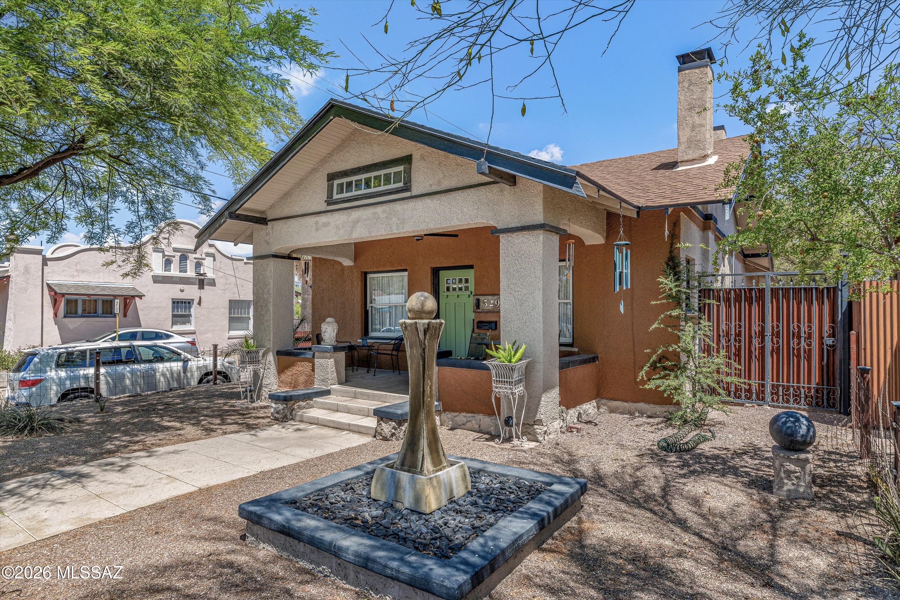West University Charmer, close to downtown, dining, arts, UofA & shopping. Built in 1915 extensively remodeled home blends timeless whimsical character with modern functionality. The home has been thoughtfully updated to meet today's lifestyle while preserving the warmth and personality of the historic home.The beautifully redesigned kitchen features a functional layout, multiple pantry spaces, and smart storage solutions that make everyday living effortless. Updated finishes throughout complement the home's historic appeal, perfect balance of old-world charm and contemporary comfort.Spacious living areas, restful bedrooms (3rd bedroom currently being used as an office), remodeled bathrooms, and carefully selected upgrades provide peace of mind while maintaining the home's character.