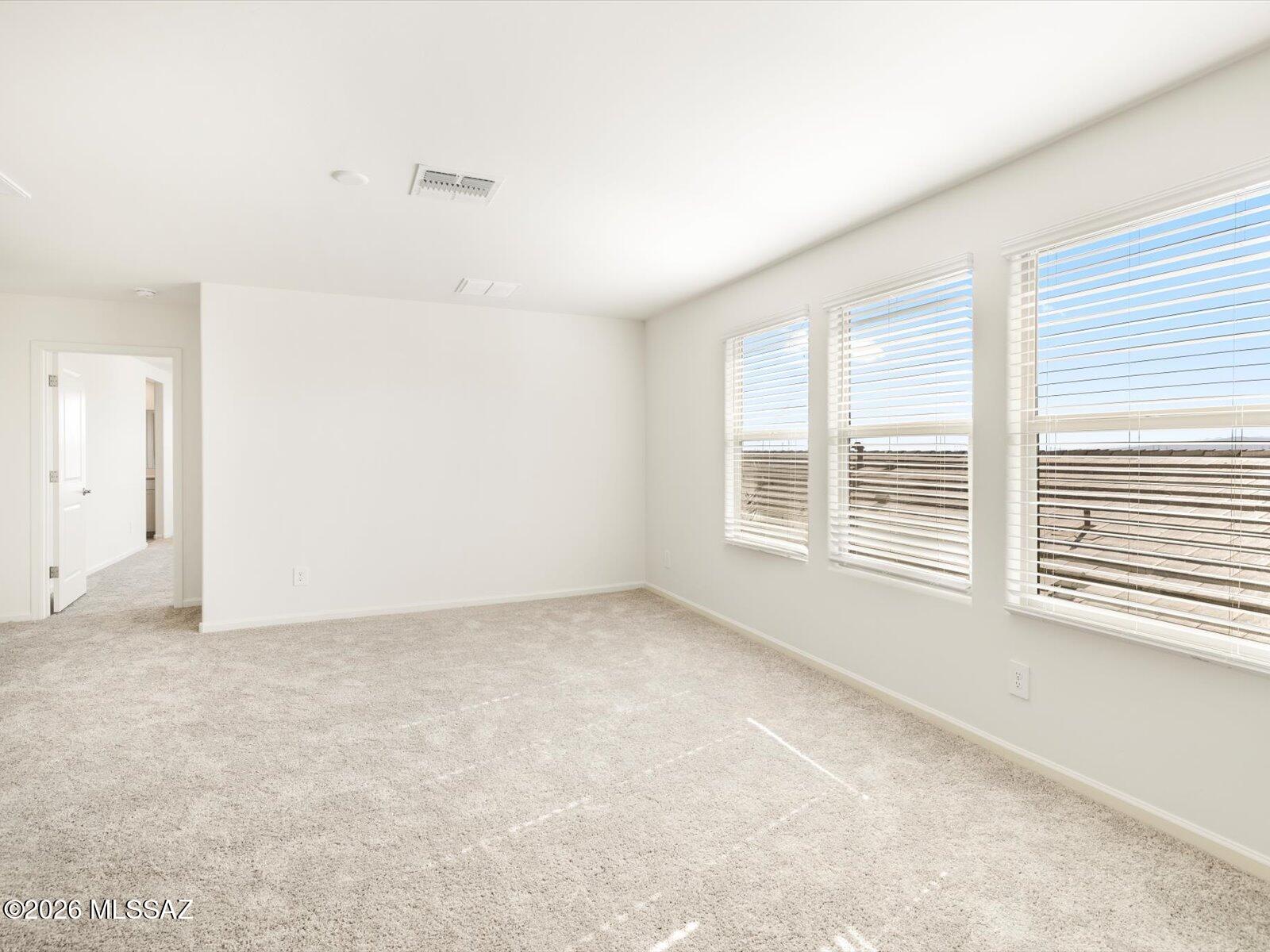 Move-In Ready and Waiting for You! This spacious 4-bedroom, 3-bath home features an open-concept design with a stylish kitchen, oversized island, and expansive great room perfect for gathering with family and friends. The versatile fourth bedroom includes a walk-in closet and can easily serve as a home office, media room, or hobby space. Located in the sought-after Rincon Crest at Rocking K community in Vail, you'll enjoy access to award-winning Vail schools, pickleball courts, playgrounds, a splash pad, and more. Plus, this home comes complete with a washer, dryer, refrigerator, and whole-home blinds. Built with innovative energy-efficient features for comfort, convenience, and savings year-round!