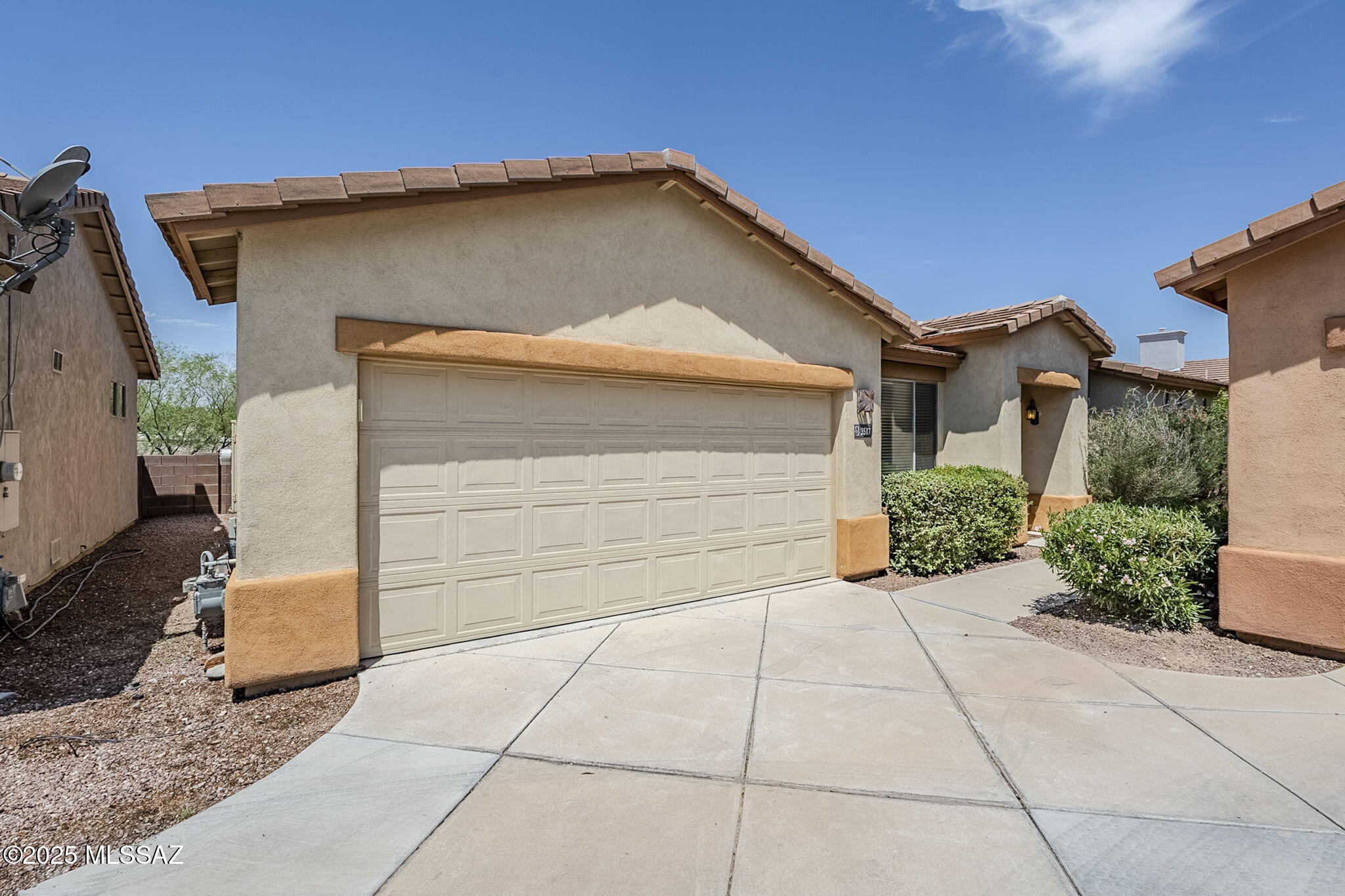 Welcome to the extremely desirable and gated community of Hacienda Del Rio Neighborhood. LOCATION, LOCATION, LOCATION!!! Minutes from shopping, restaurants and steps to the Rillito River Walk/Loop. Set with an open floor plan, walk right into the family room and dining area. Move into the large kitchen with breakfast bar island and a pantry closet. This home offers a split 3 bedroom set up, Primary bathroom and HUGE walk-in closet has new flooring, second bedroom has a Murphy bed installed and new closet. 2-car garage allows for extra storage and privacy, back yard is low maintenance with a artificial turf, perfect for being outside and enjoying those Arizona sunsets. Location is everything with this home, move quick!